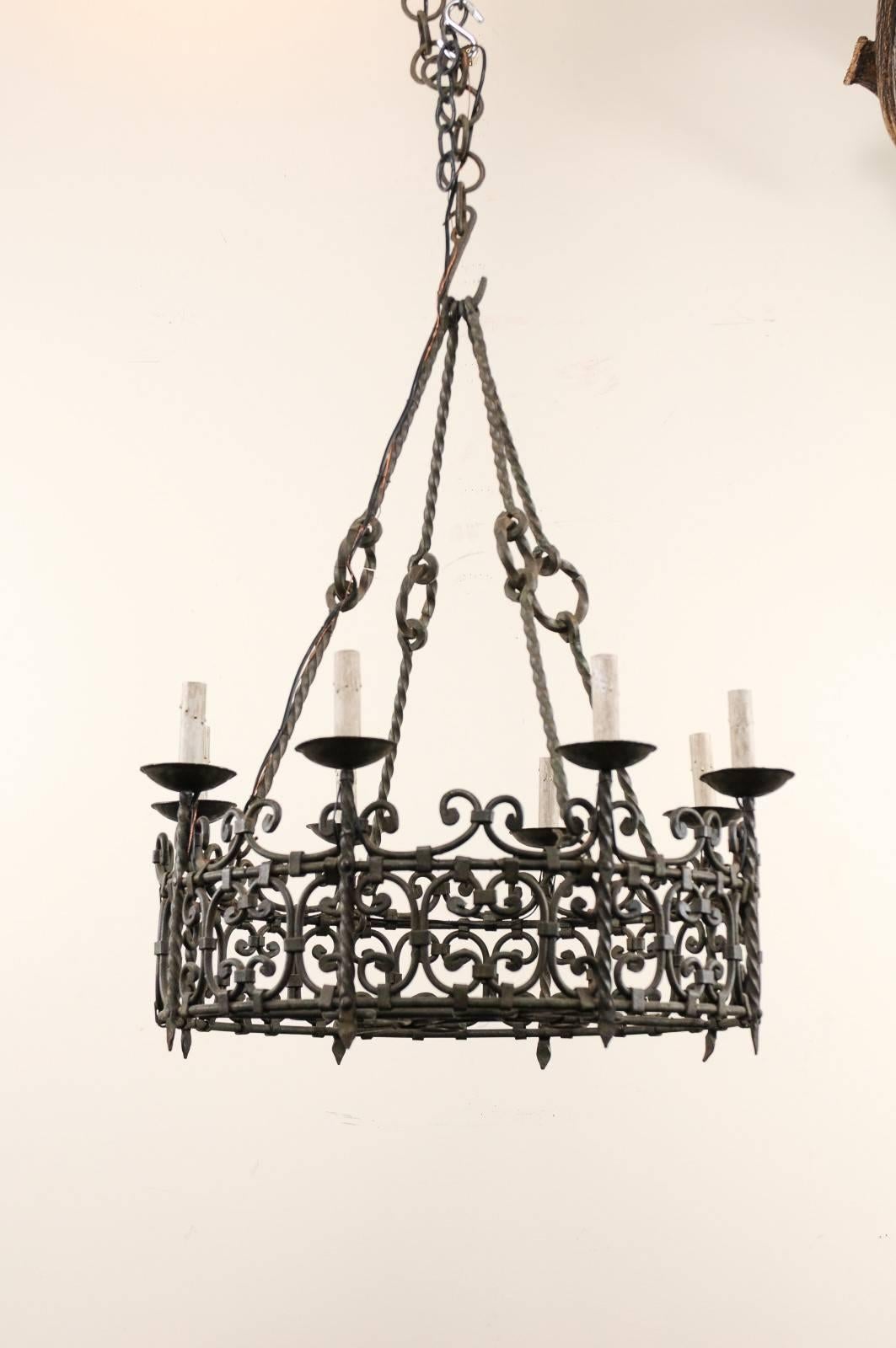 Patinated Eight-Light Intricately Scrolled Dark Iron Ring Chandelier, Mid-20th Century For Sale
