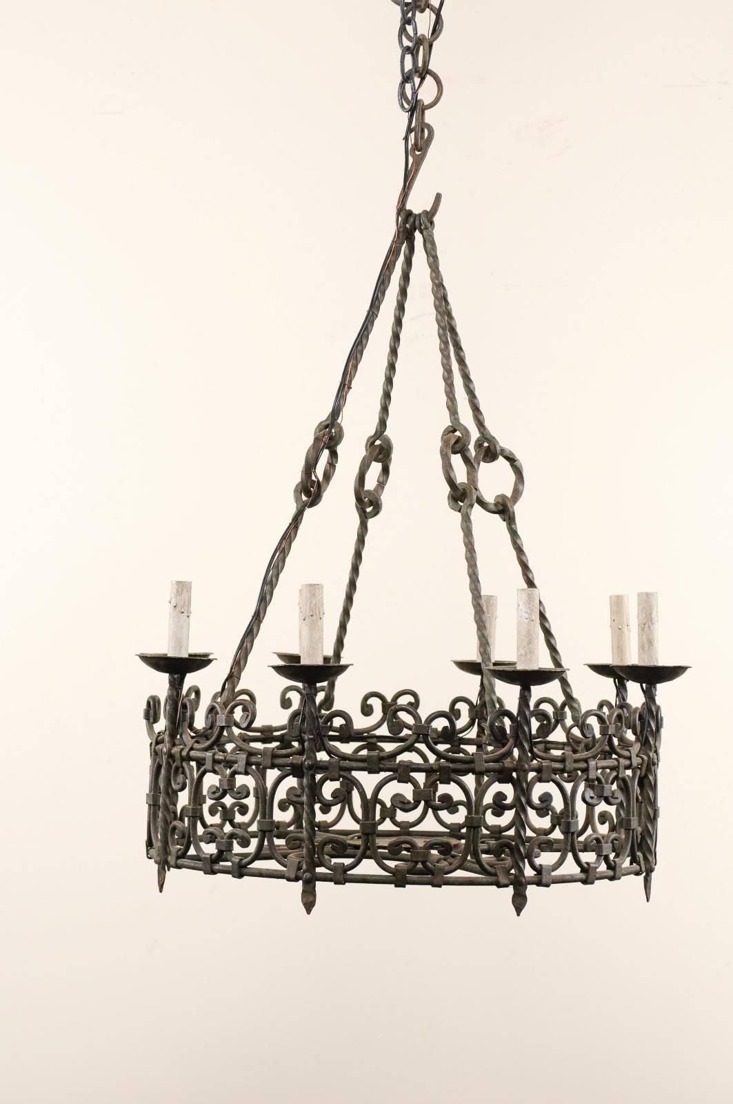 French Eight-Light Intricately Scrolled Dark Iron Ring Chandelier, Mid-20th Century For Sale