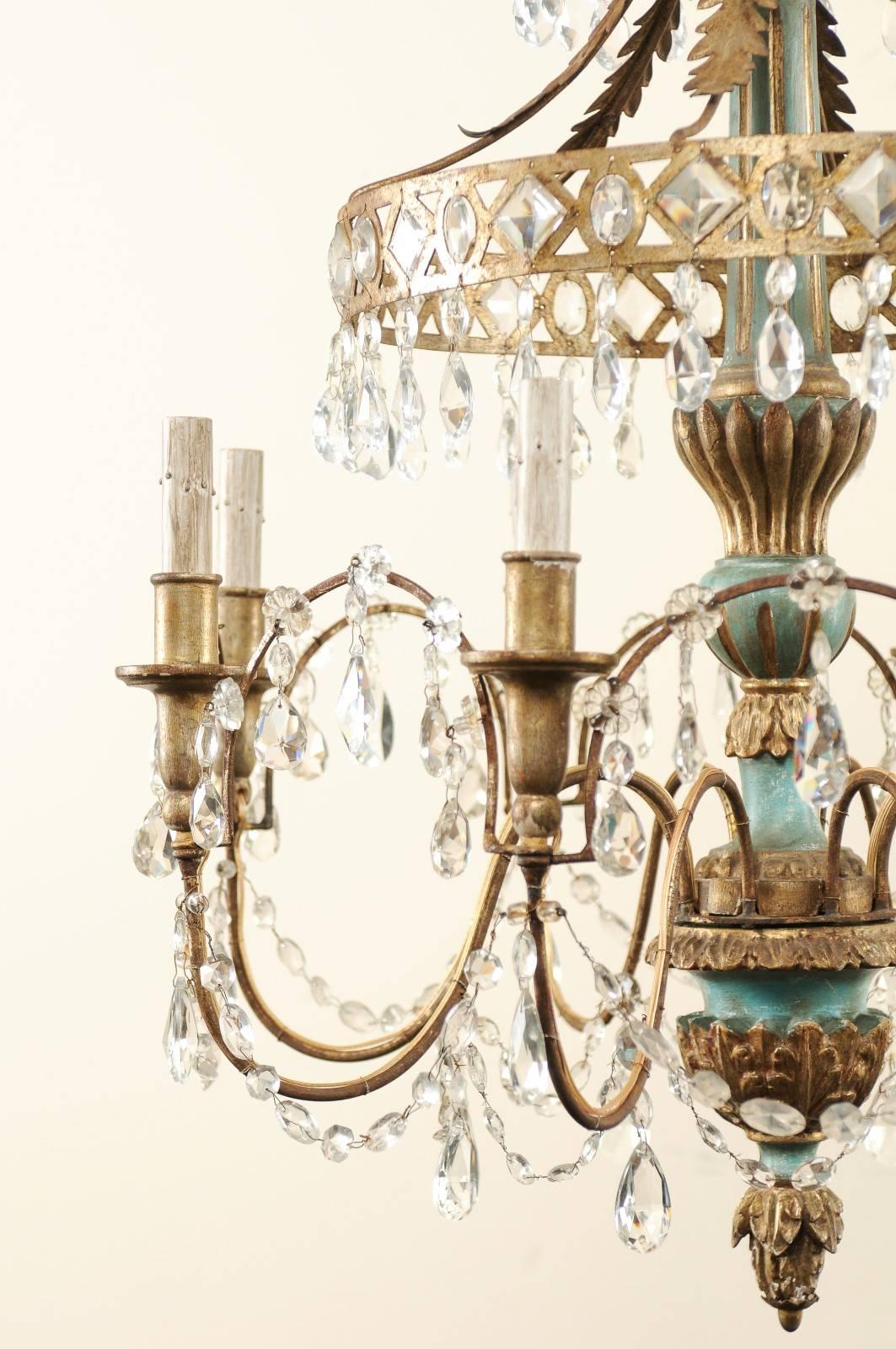 Carved Midcentury Italian Eight-Light Crystal and Wood Chandelier with Pale Teal Tones