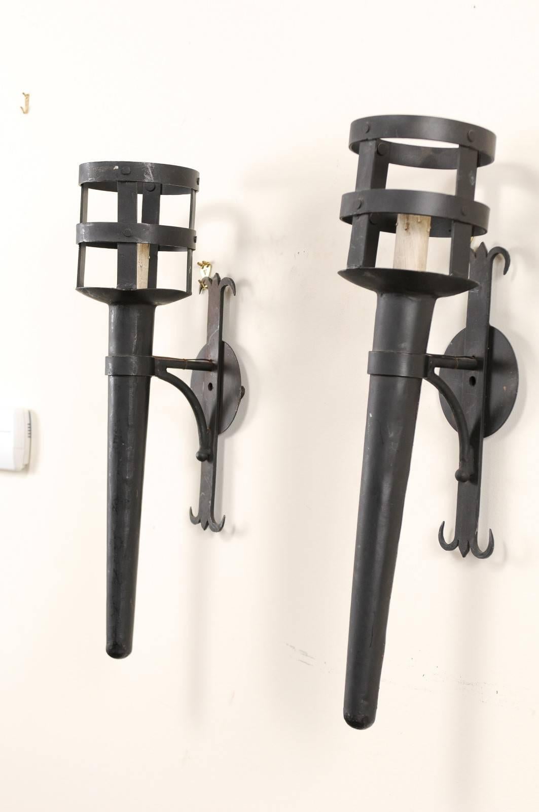 Pair of Tall and Narrow Iron Torch Single-Light Wired Black Sconces In Good Condition In Atlanta, GA