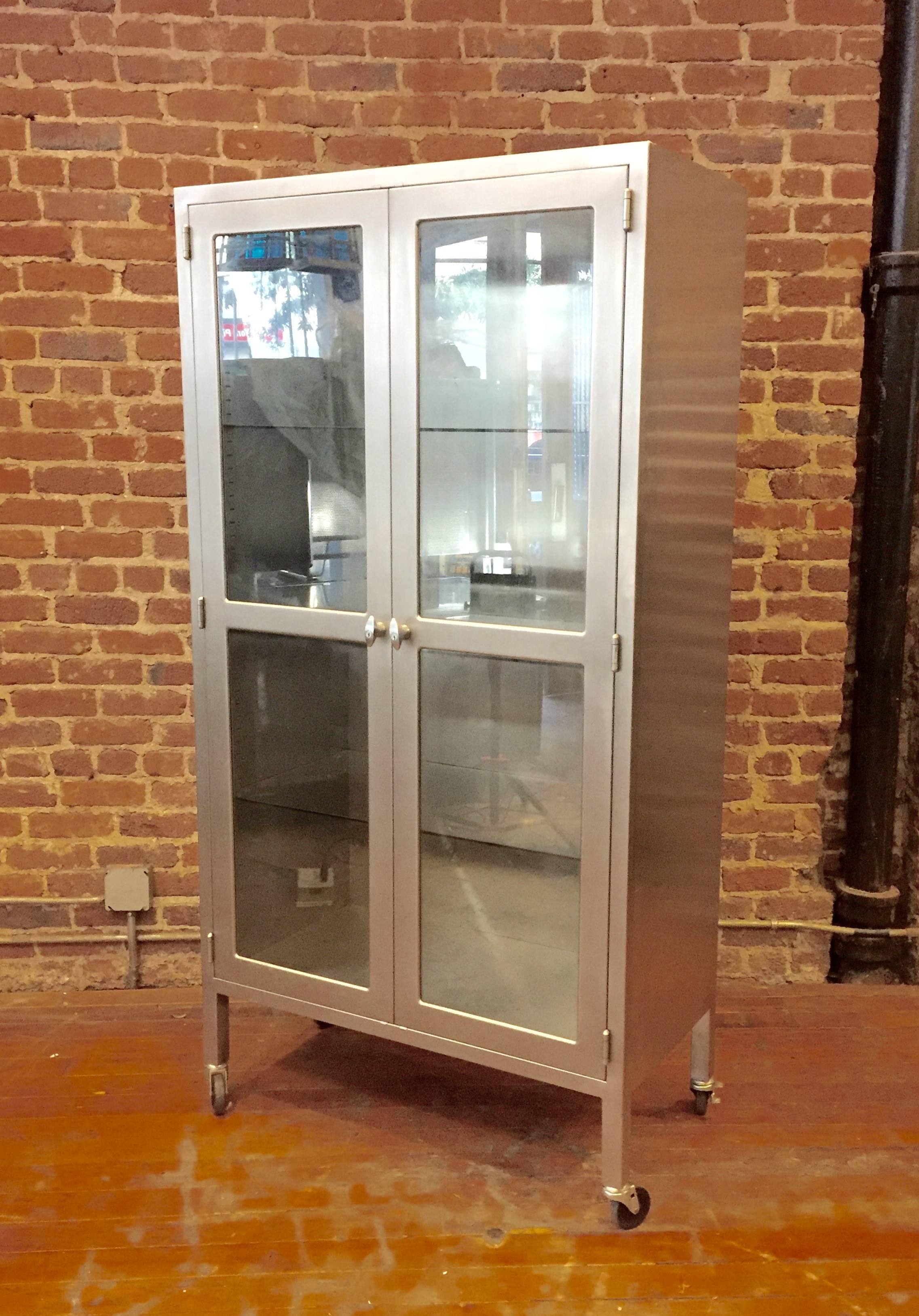 Excellent quality stainless steel medical cabinet with glass doors. Perfect for storage and display.