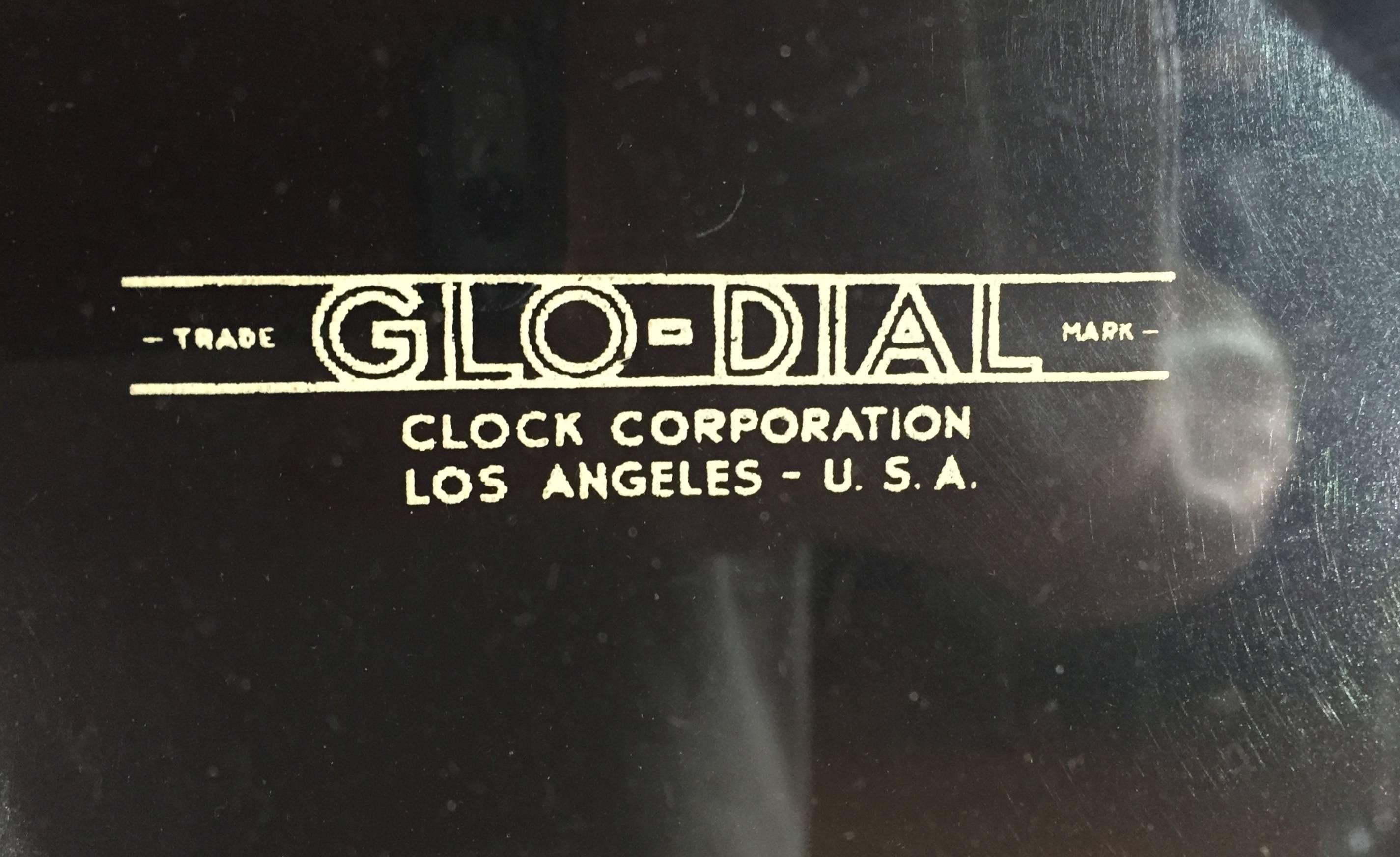 This neon wall clock is an exceptionally handsome example of a bygone era. Excellent structural and working condition. I believe this is the largest model made by Glo Dial Corp.