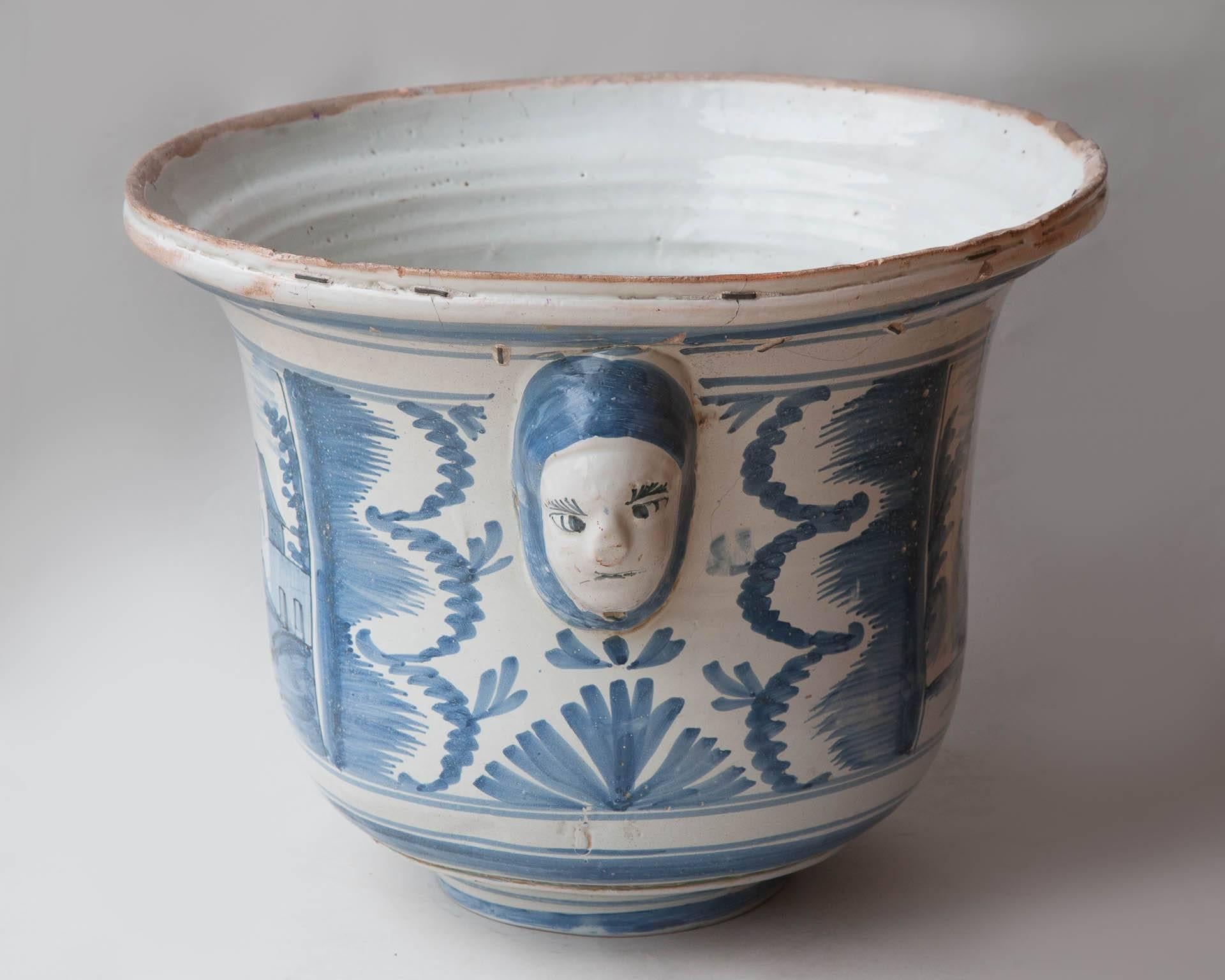 Decor de camaieu bleu with two masked handles.
France c. 1760

It was due to Louis XIV that Nevers became celebrated for the production of faïence. Towards the end of the 16th century he bought Augustin Conrade a potter from Albissola near