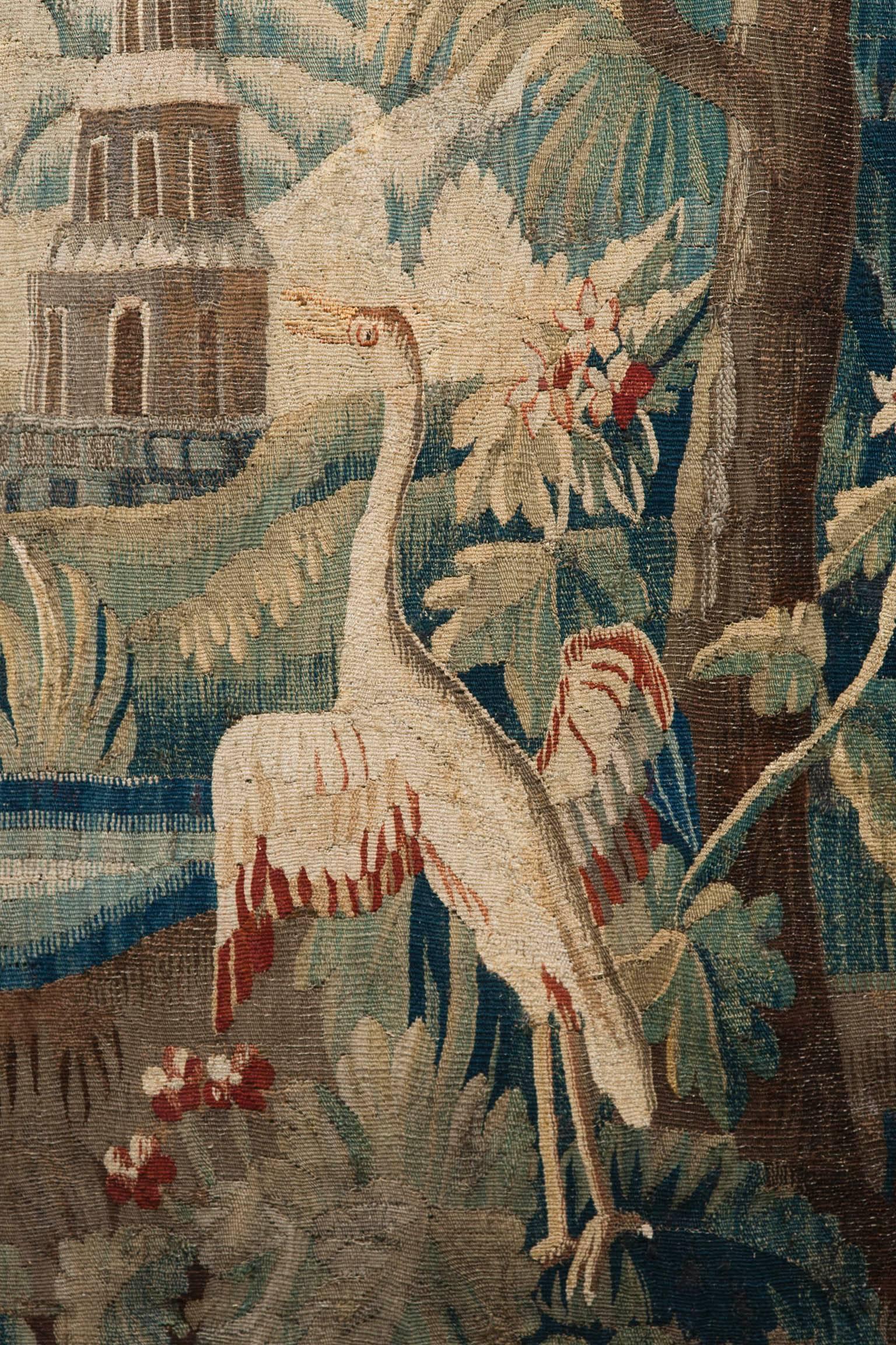 With two exotic birds, a fruit tree and a pagoda in the distance.
France, late 18th century in the chinoiserie taste.

Woven in wool and silk and backed in linen.
The tapestry has been cleaned, lightly restored and relined.