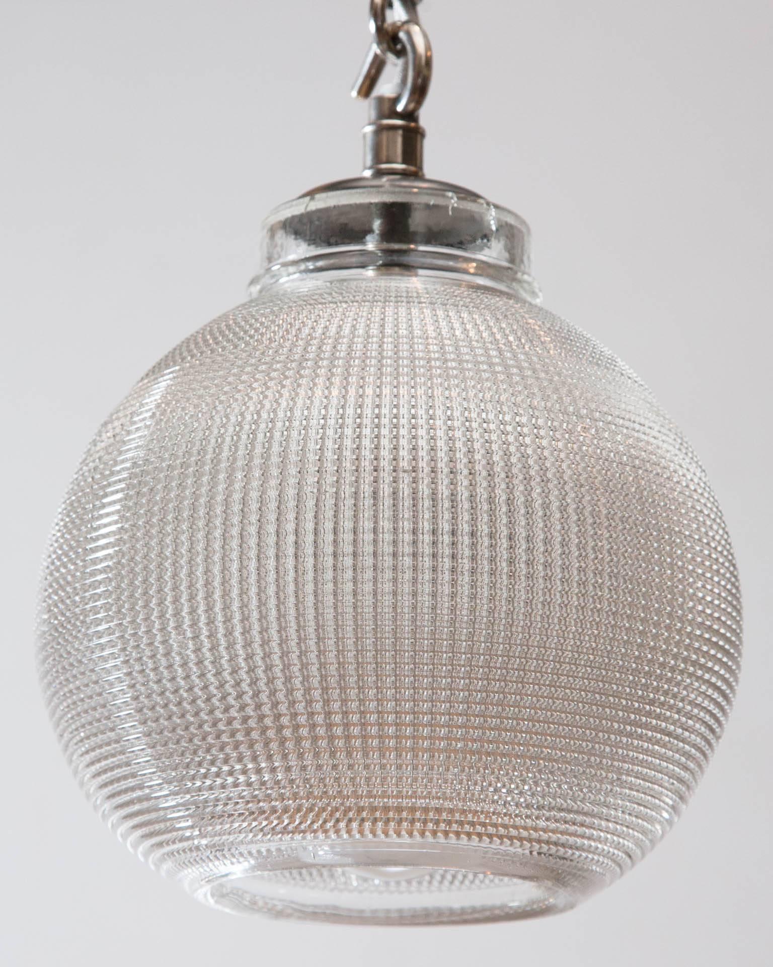 Early 20th century holophane globe dish light with hammered silver gallery.
English or American, circa 1910.
   
