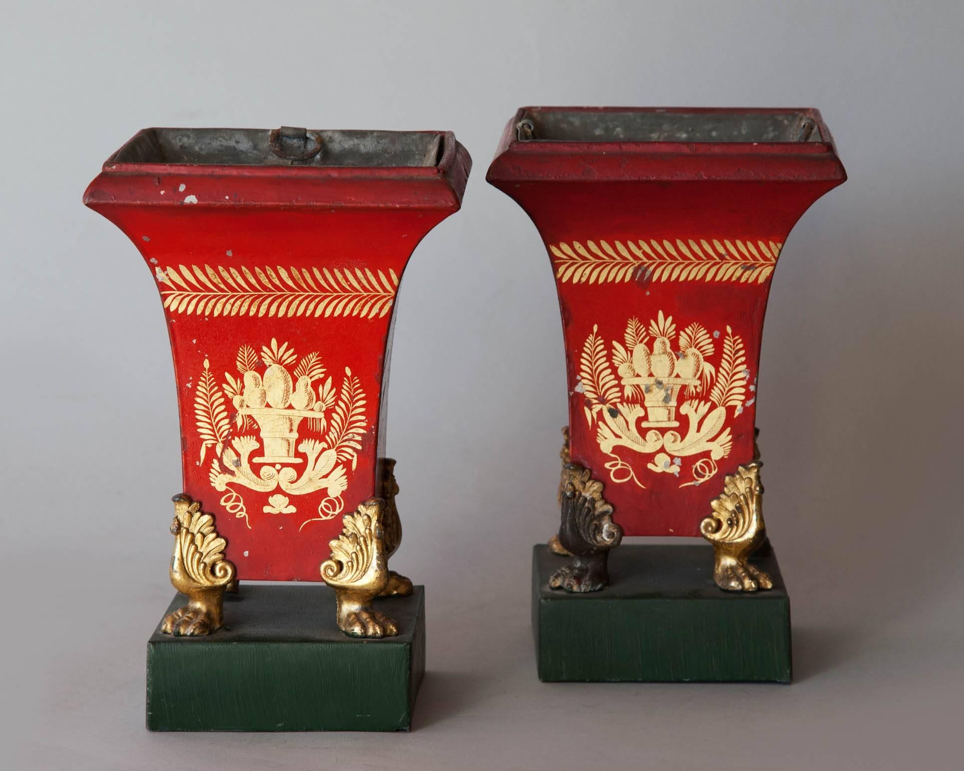 Painted in red and green with gilt decoration. Gilt paw feet. 
With original zinc liners, France, circa 1820.

We are members of LAPADA and CINOA.