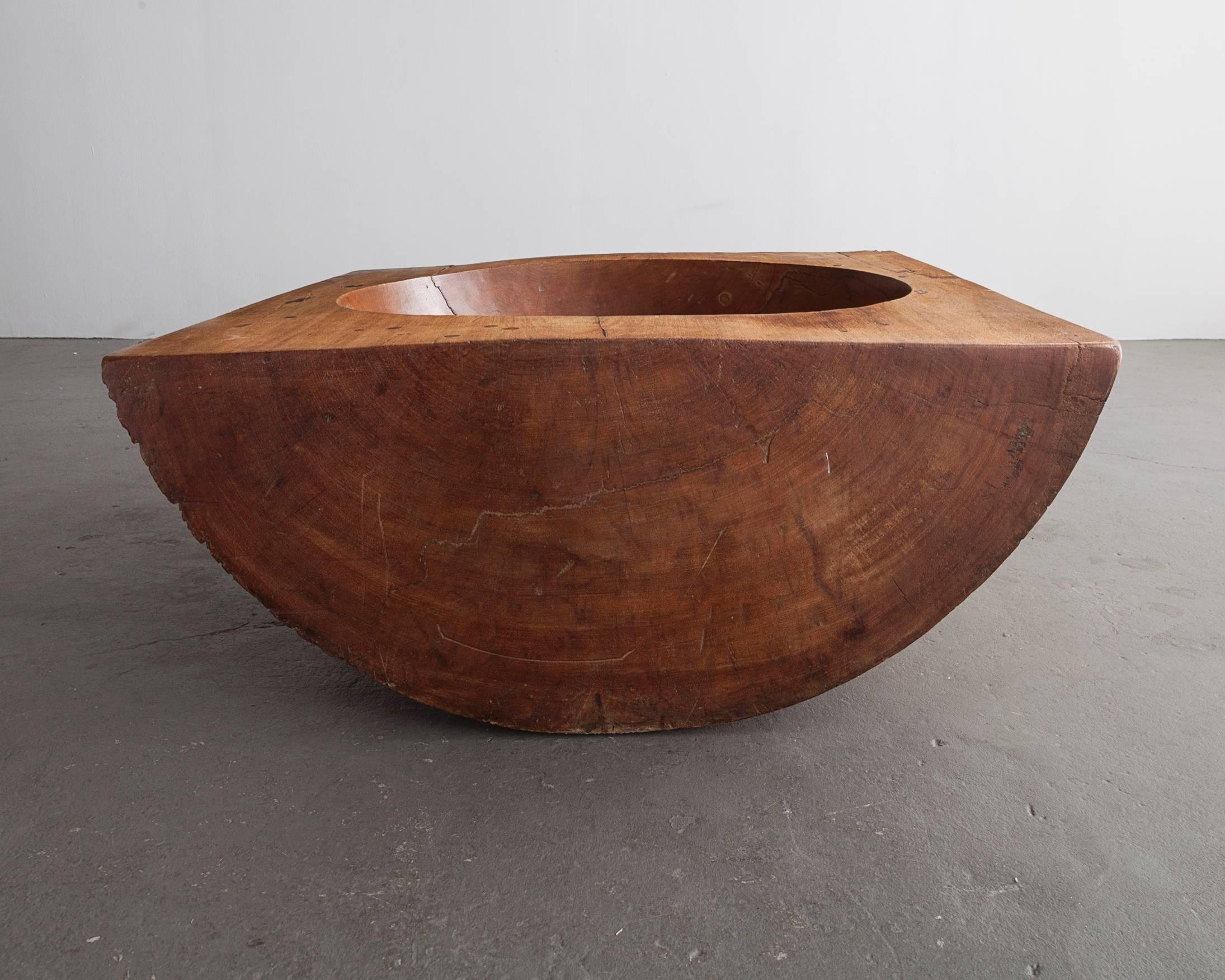 Coffee table in solid wood with sculpted concave center. Designed by Jose Zanine, Brazil, circa 1960.