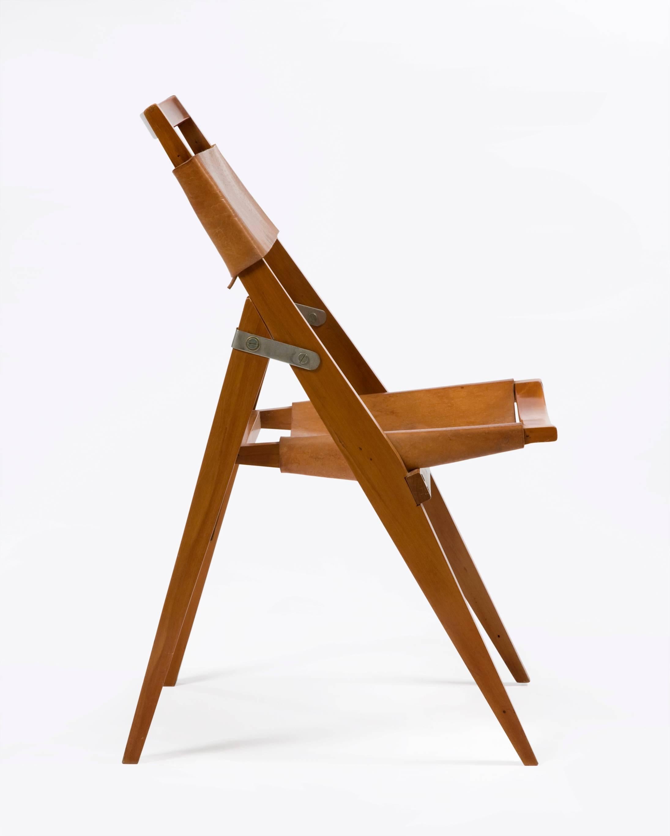 Lina Bo Bardi folding chair manufactured by Estudio Arte De Palma, Sao Paulo, Brazil, 1950s.