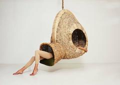 Bwa Leaf Mask Sculptural Hanging Seat in Woven Leather and Kubu Rattan