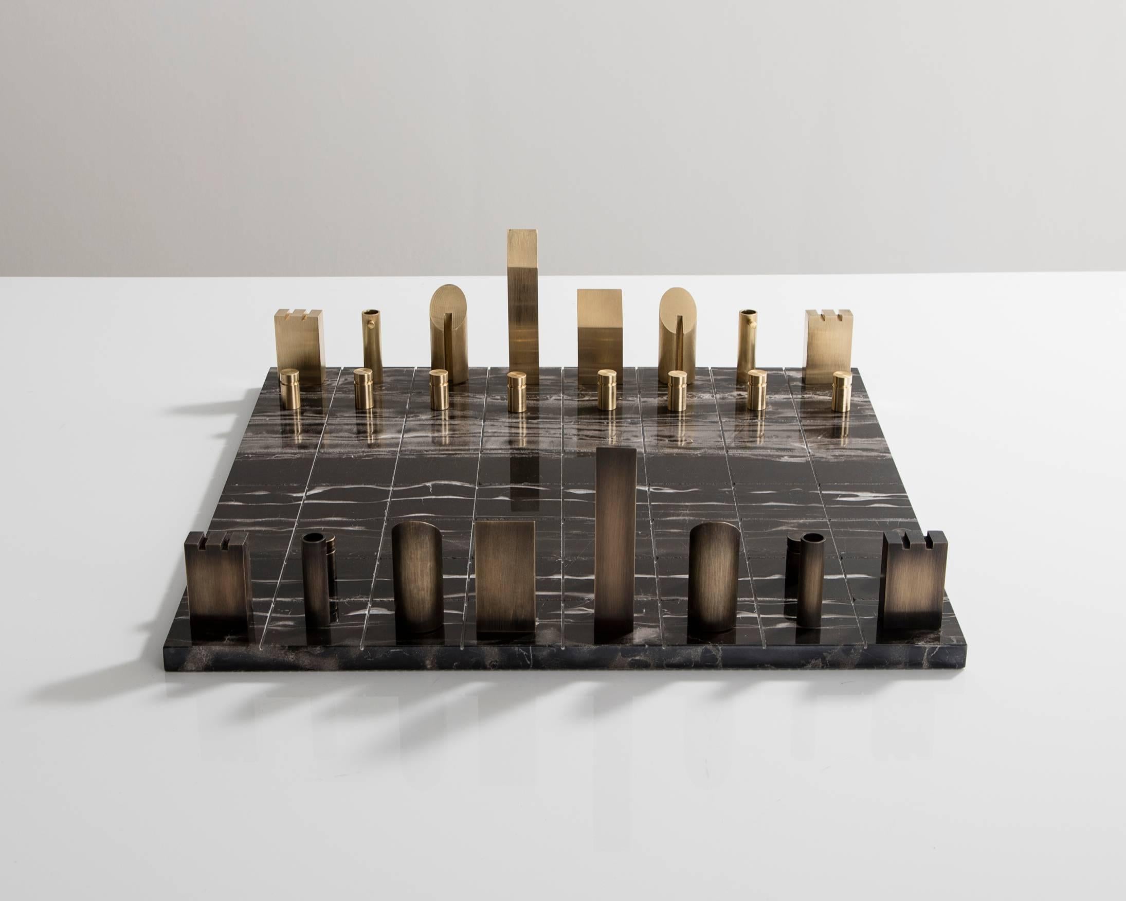Chess set in polished and patinated bronze. Designed and handmade by Gabrielle Shelton, USA, 2016.