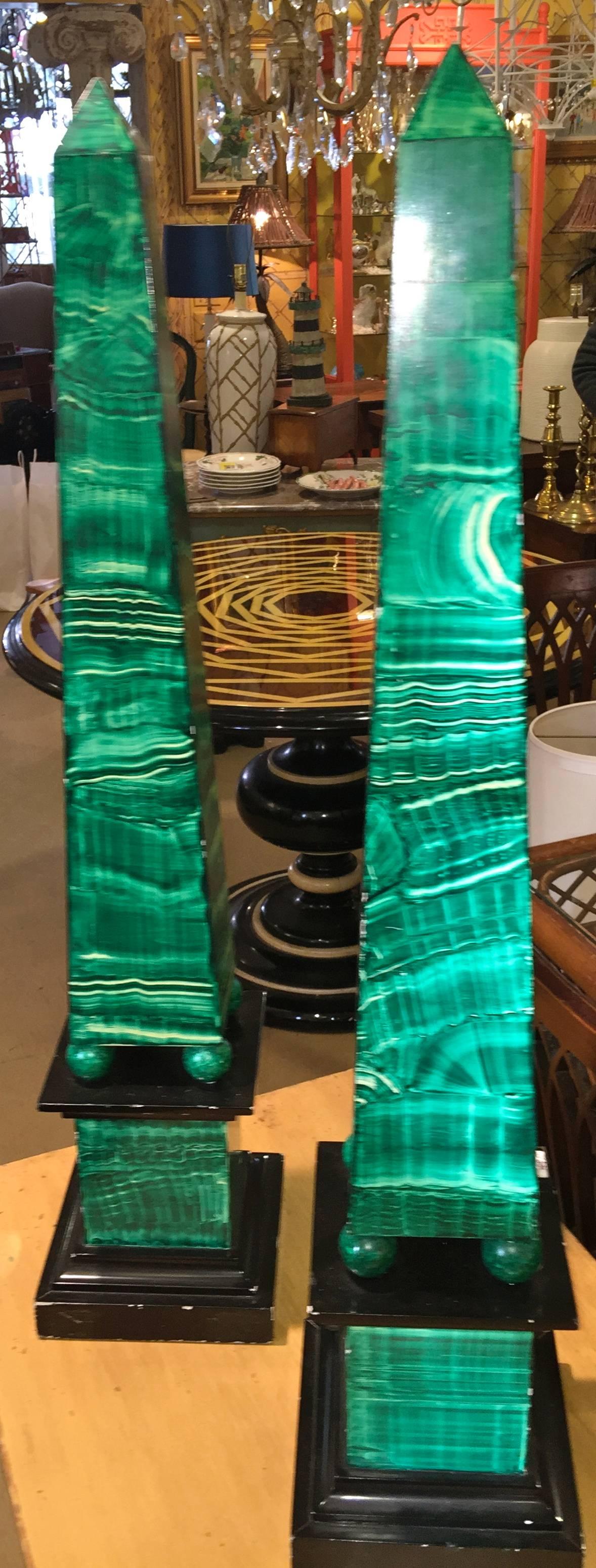 Pair of continental faux painted malachite wooden pyramids.