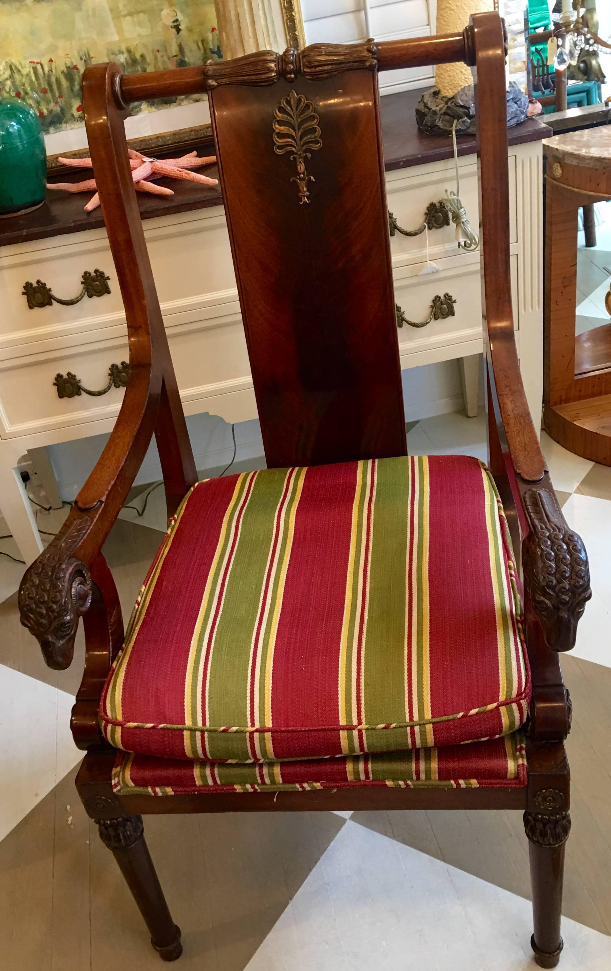 English late 19th century, Edwardian mahogany ram's head armchair.