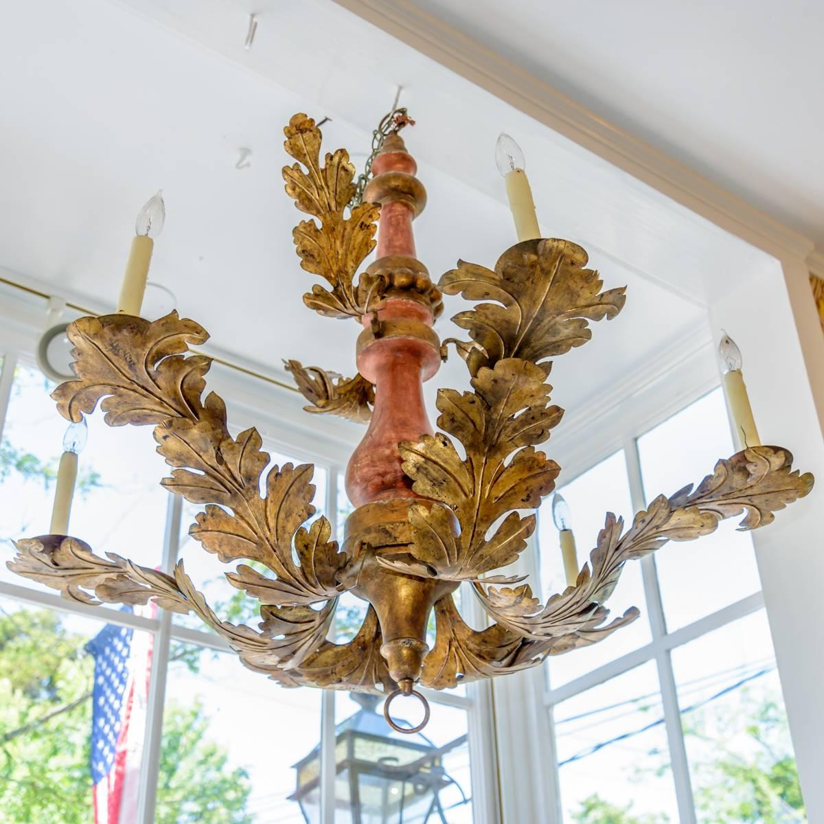 Italian painted wood and gilt tole chandelier.