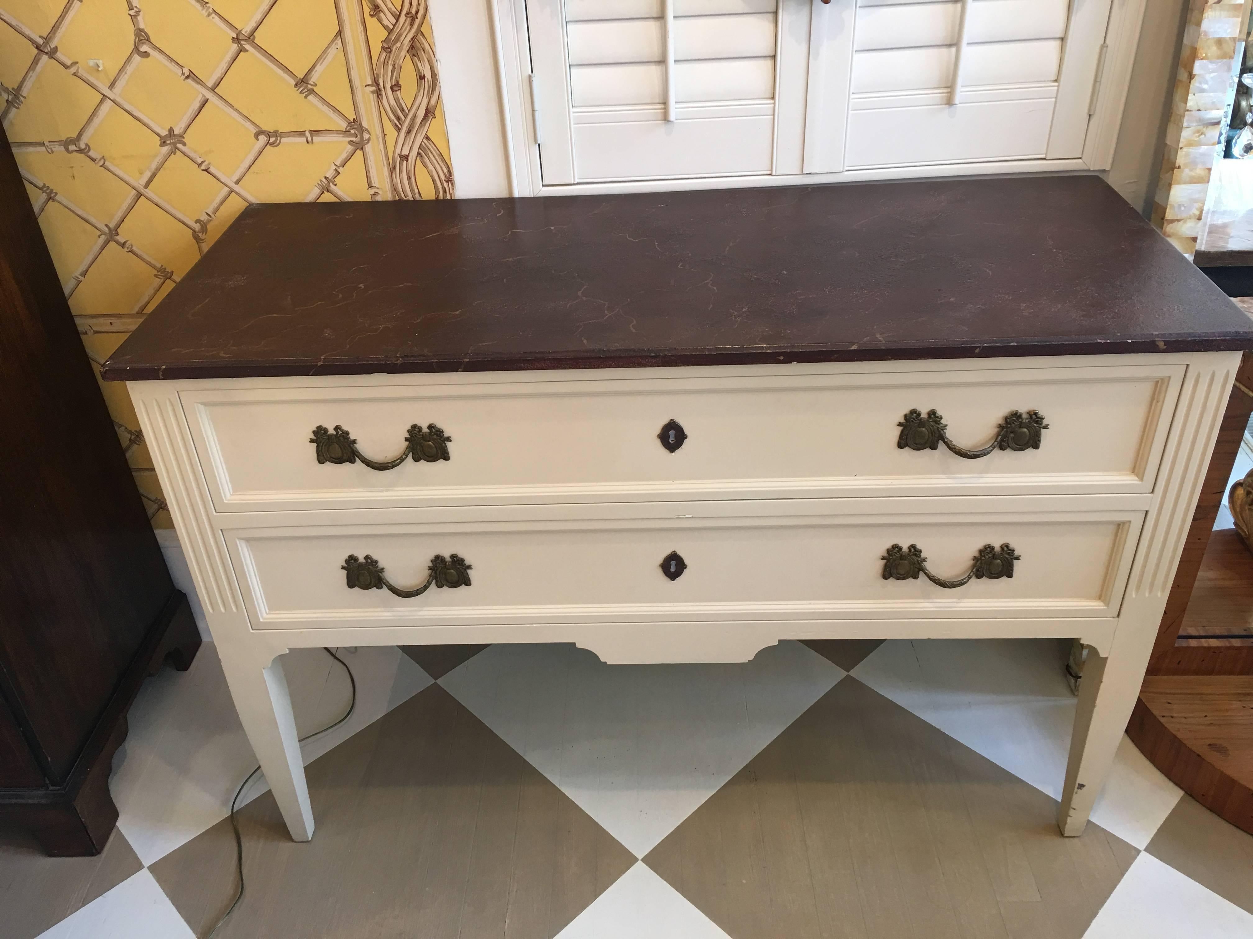 Pair of French Mid-Century chest of drawers, crème color base with brown faux marble tops in the Hepplewhite style.