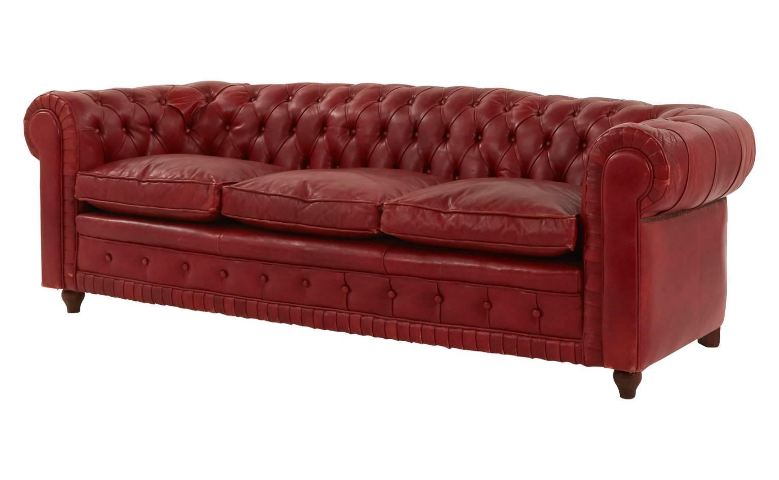 Original red leather.
Tufted Chesterfield design
Early 20th Century
France

Dimensions:
Overall: 75'W x 31'D x 26'H
Seat: 62'W x 21'D x 18.5'H