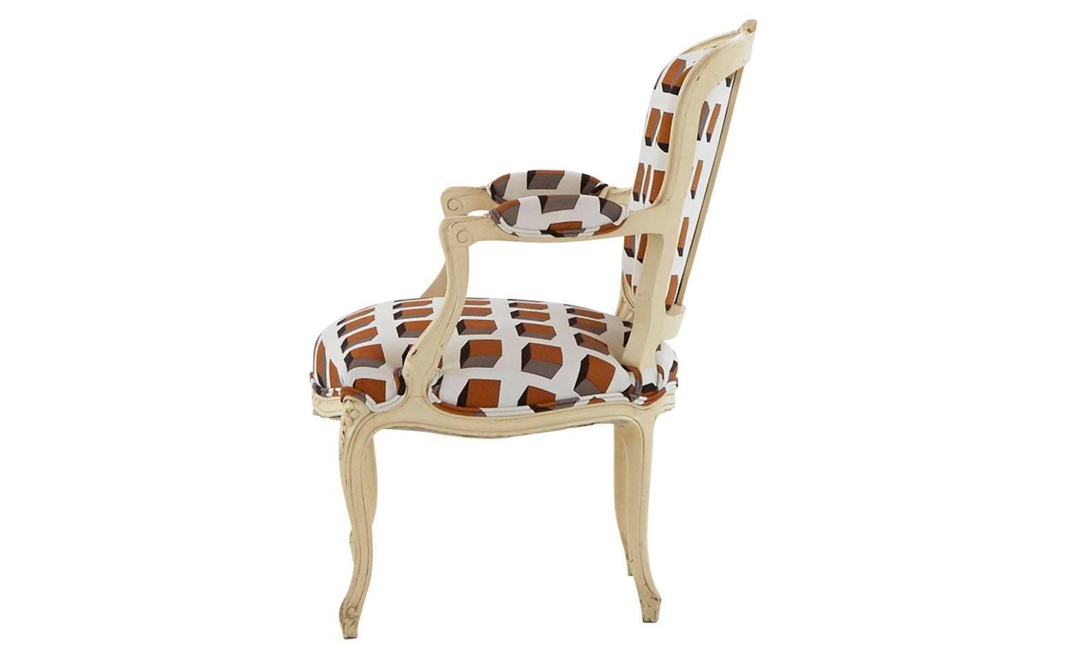 Reupholstered in Gaston y Daniela geometric cotton
Hand-painted ivory wood frame
20th century
France

Dimensions:
Overall: 21.5'D x 25'W x  34'H 
Seat height: 15.5'H
Arm height: 24.5'H