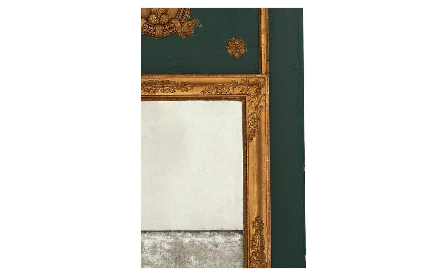 Hand-painted green trumeau panel
Gilded frame with original mirror
20th century
France.
Measures: 3'D x 35'W x 76'H 