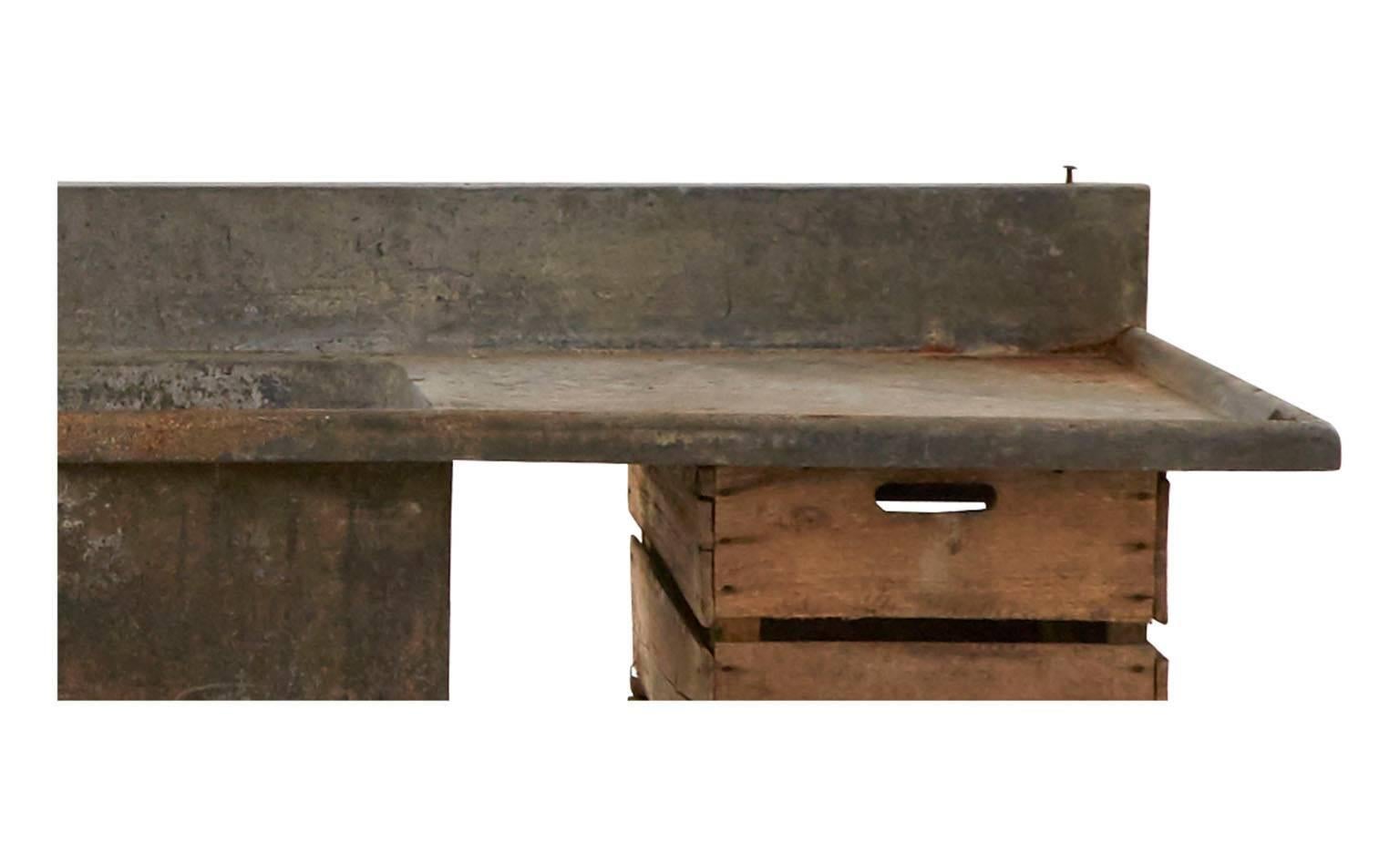 Patinated zinc outdoor sink
Wooden crate base
France

Dimensions:
Overall: 92'W x 25'D x 29.5'H
Counter: 25.5'H
