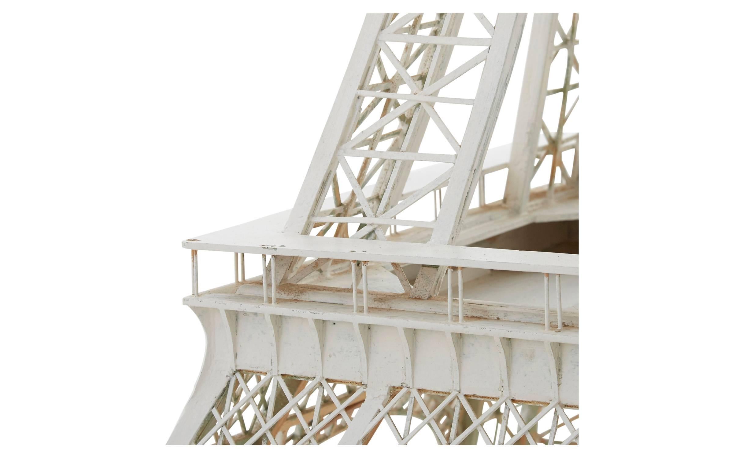 •Powder coated white wood and metal 
•Eiffel tower replica
•20th century
•France

Dimensions:
29.5 D x 29.5 W x 73 H