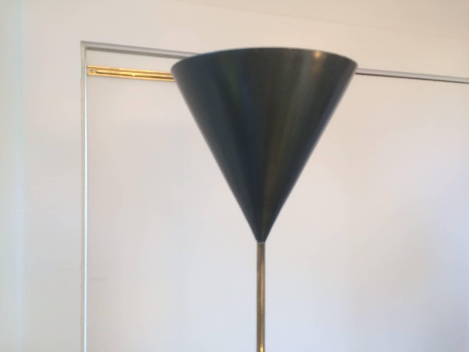 Italian brass floor lamp by Luigi Caccia Dominioni for Azucena
Chic and elegant brass with enameled black up-shade.
Early edition with original brass foot switch.