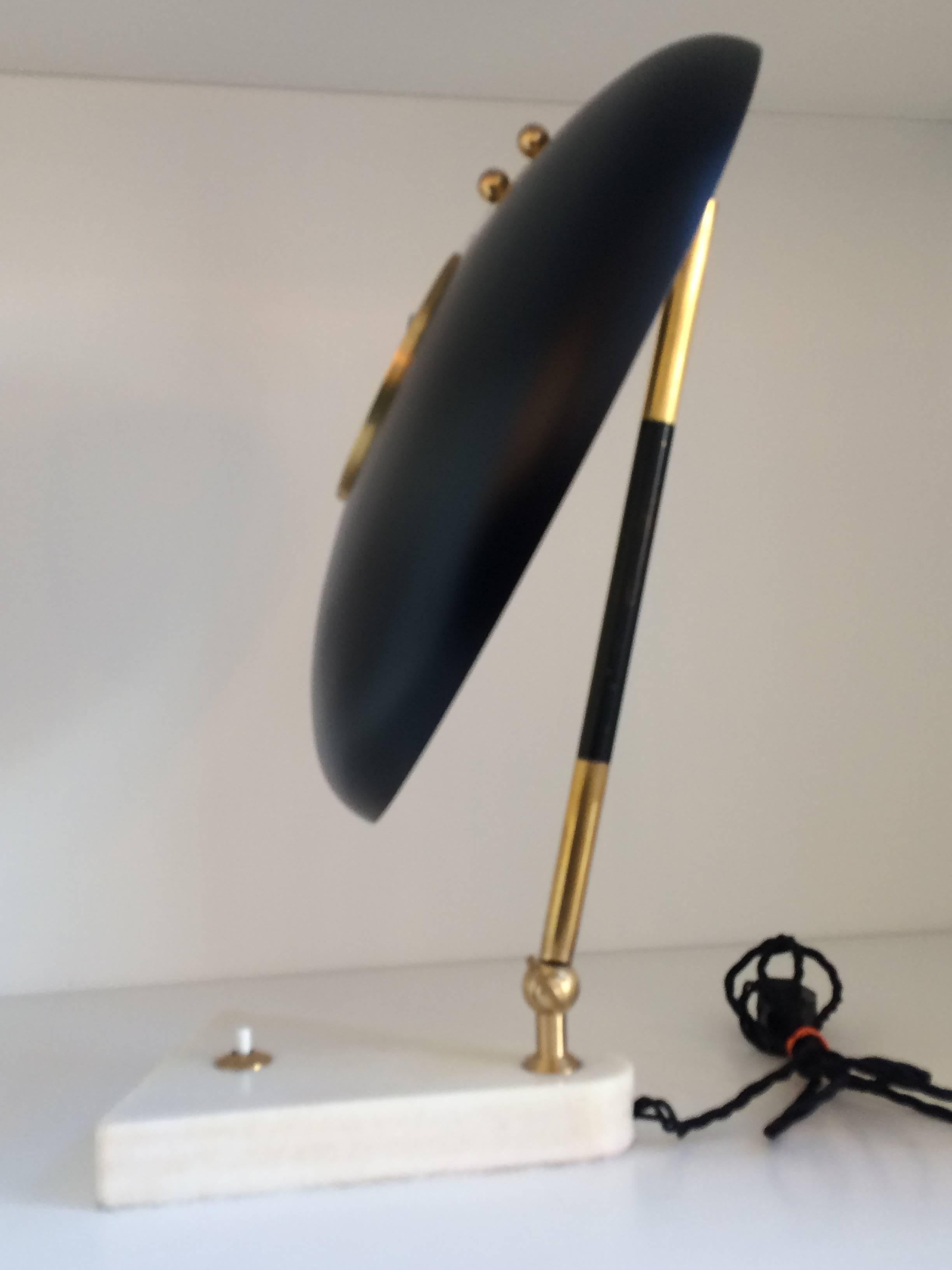 Adjustable task lamp by Stilux Milano.
  