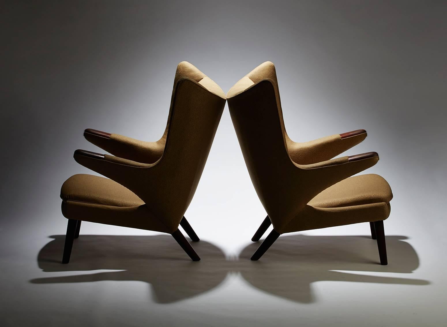 Pair of original Hans Wegner Papa Bear lounge chairs and a single ottoman. Recent restoration with high-grade Knoll textile plus new foam and webbing. Signed with Danish Control tag to underside of ottoman. Ottoman measures: 27 W x 16 D x 16 H