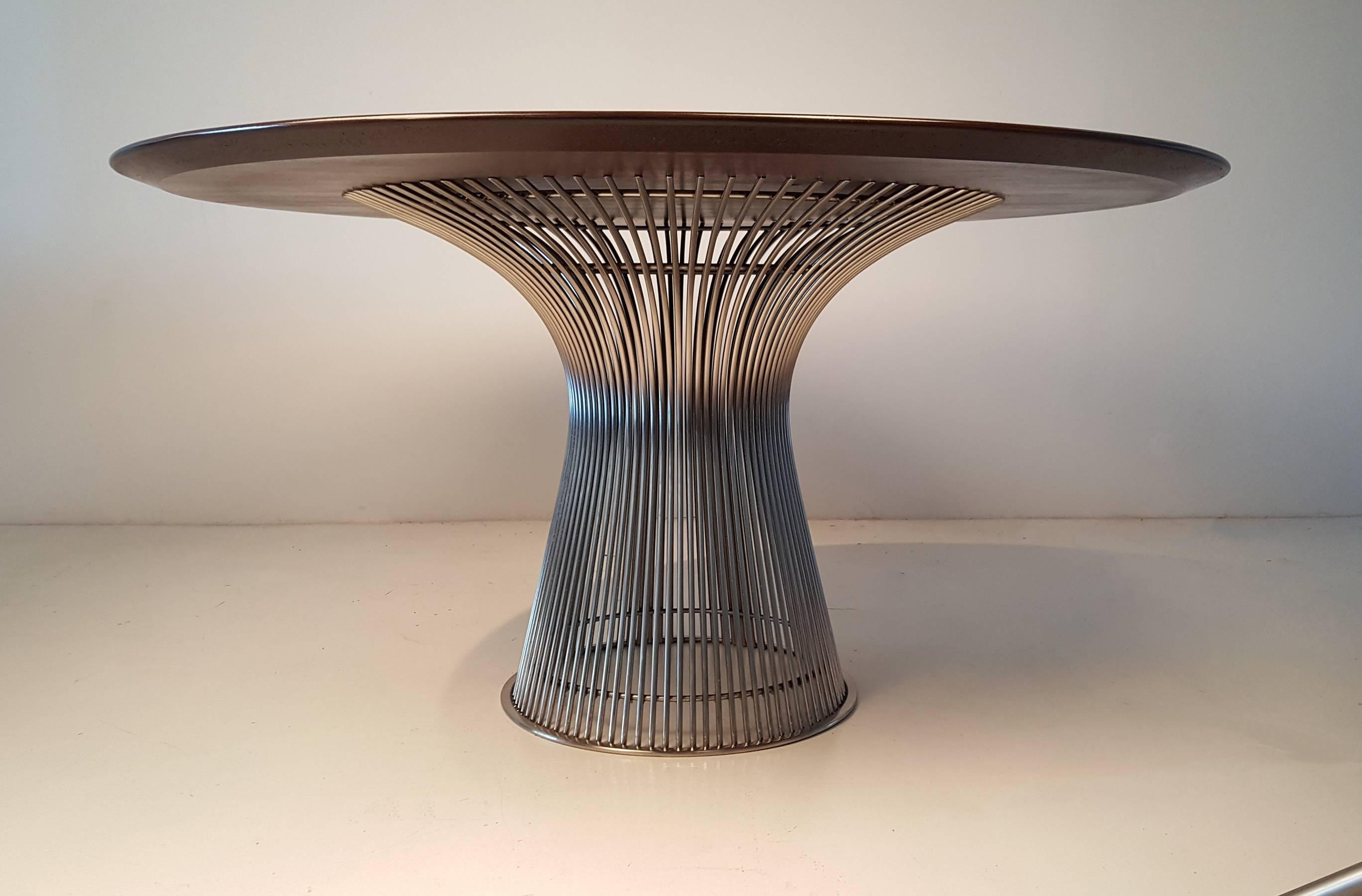 Early Warren Platner for knoll dining table with a dark walnut top and nickel-plated base.