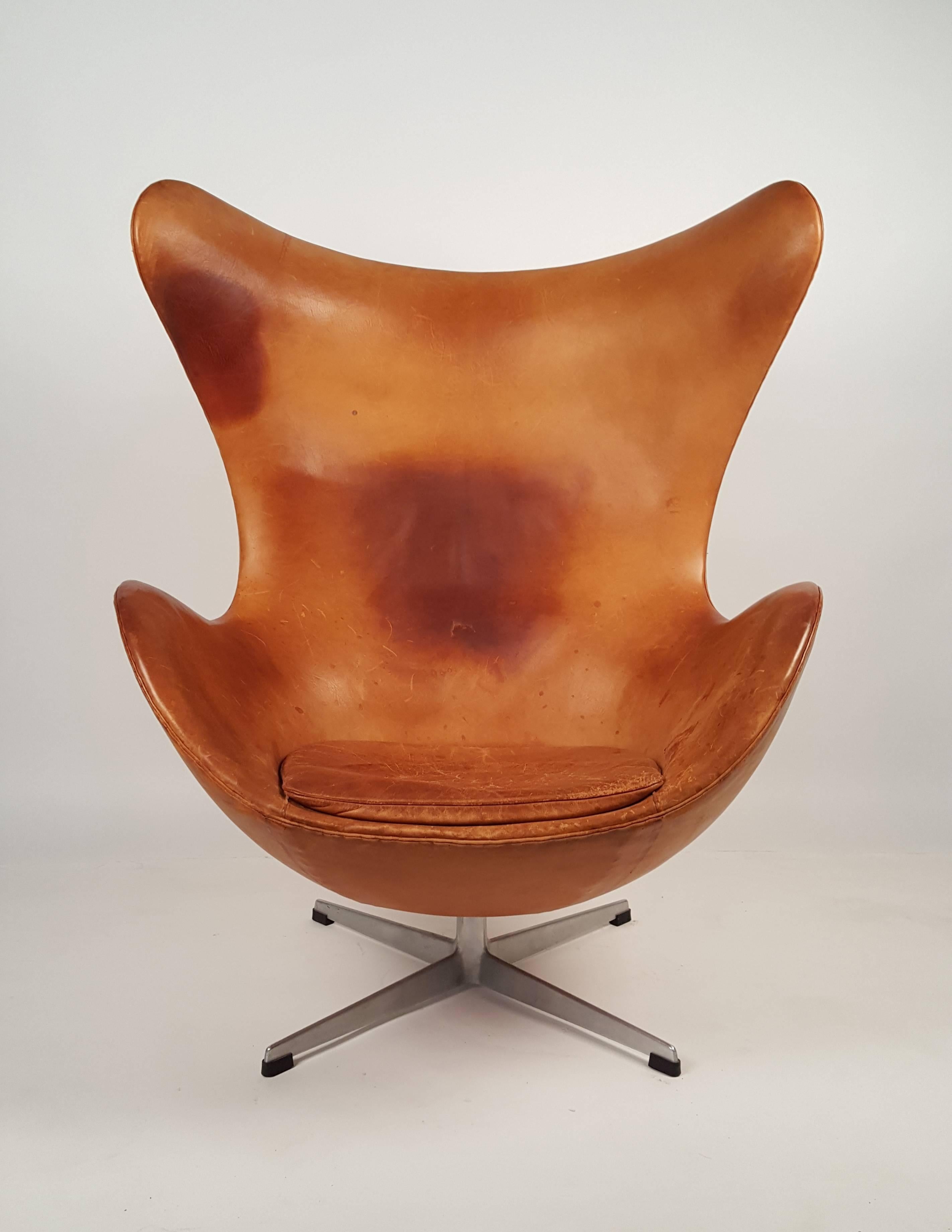 leather egg chair and ottoman