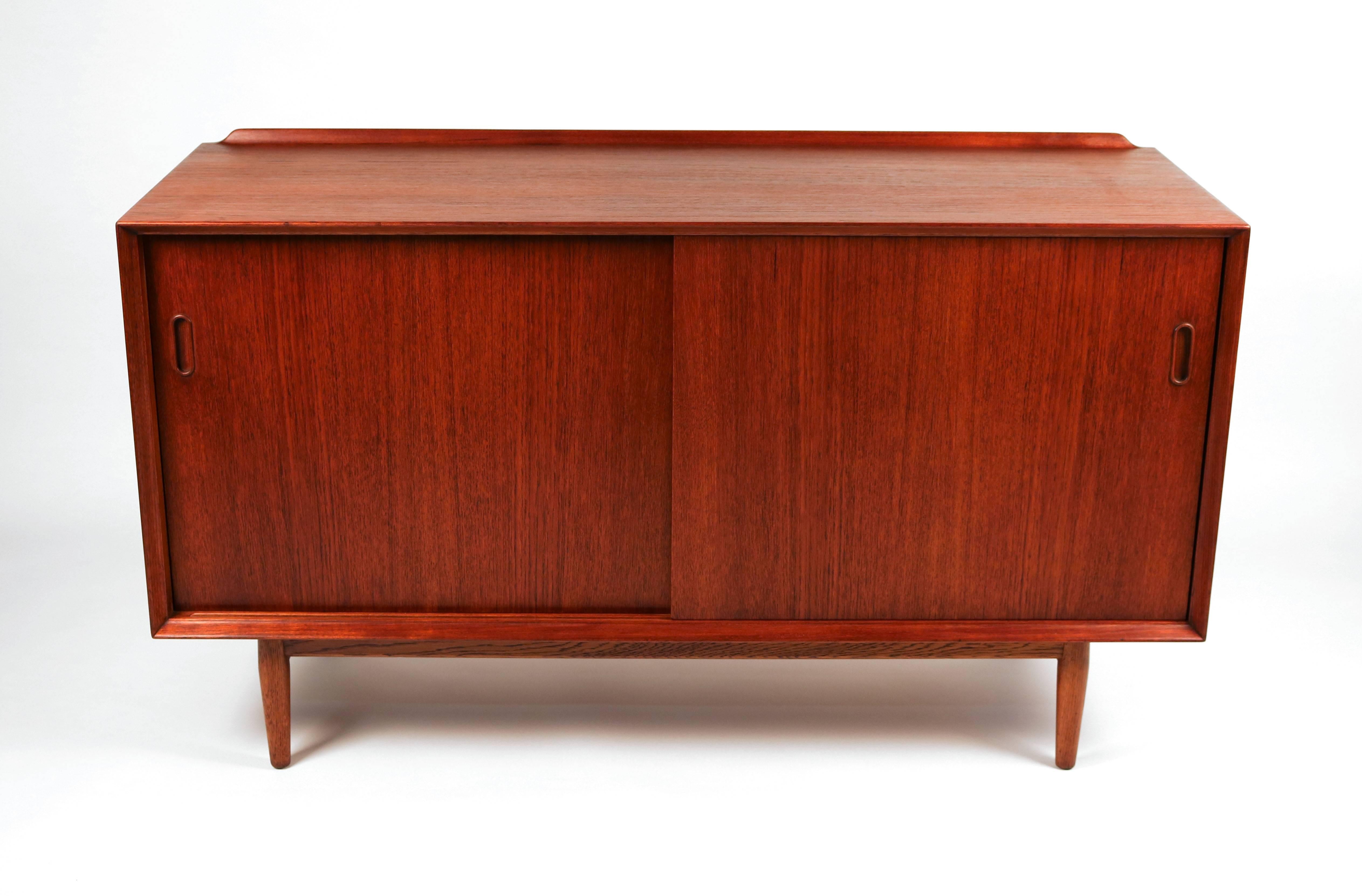 Arne Vodder for Sibast teak cabinet refreshed in Danish teak oil. A very useful size. It would work well as a small server, a media cabinet or even a dresser. 

Additional components available.