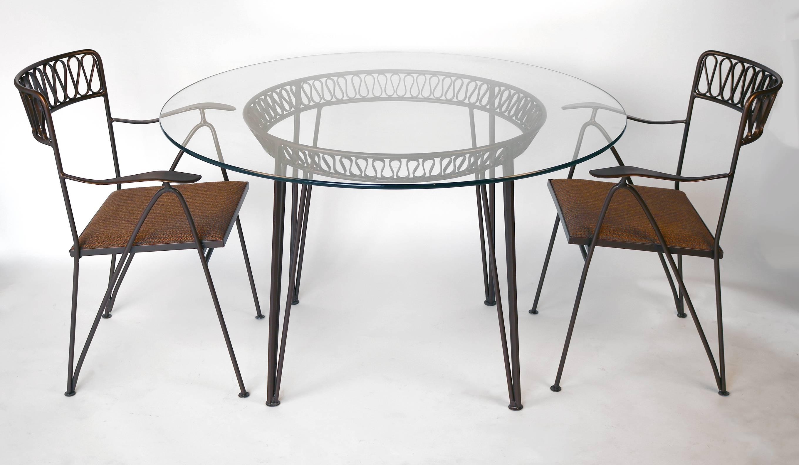 Italian designed patio or breakfast table and chairs by Tempestini for Salterini. In a bronze powder coated finish with new indoor/outdoor foam and Perrenials woven textile (also suitable for exterior use). Original glass top. Excellent condition.