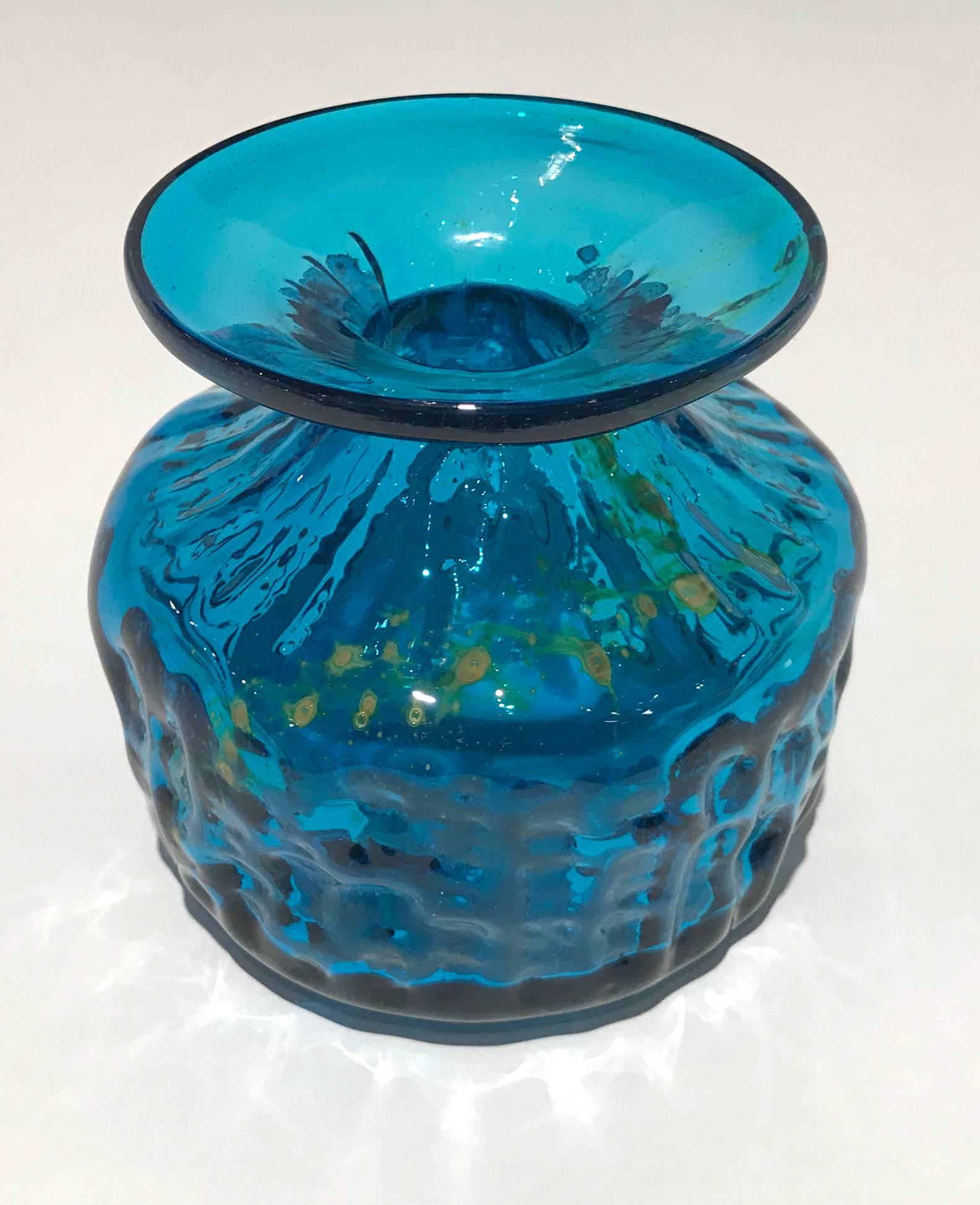 Early Handcrafted glass vase by Michael Harris for Mdina Glass on the Mediterranean Island of Malta. Signed Mdina on the base. Michael was inspired by the scenery of the island and the colors used in his work reflect the sun, sea and sand of the