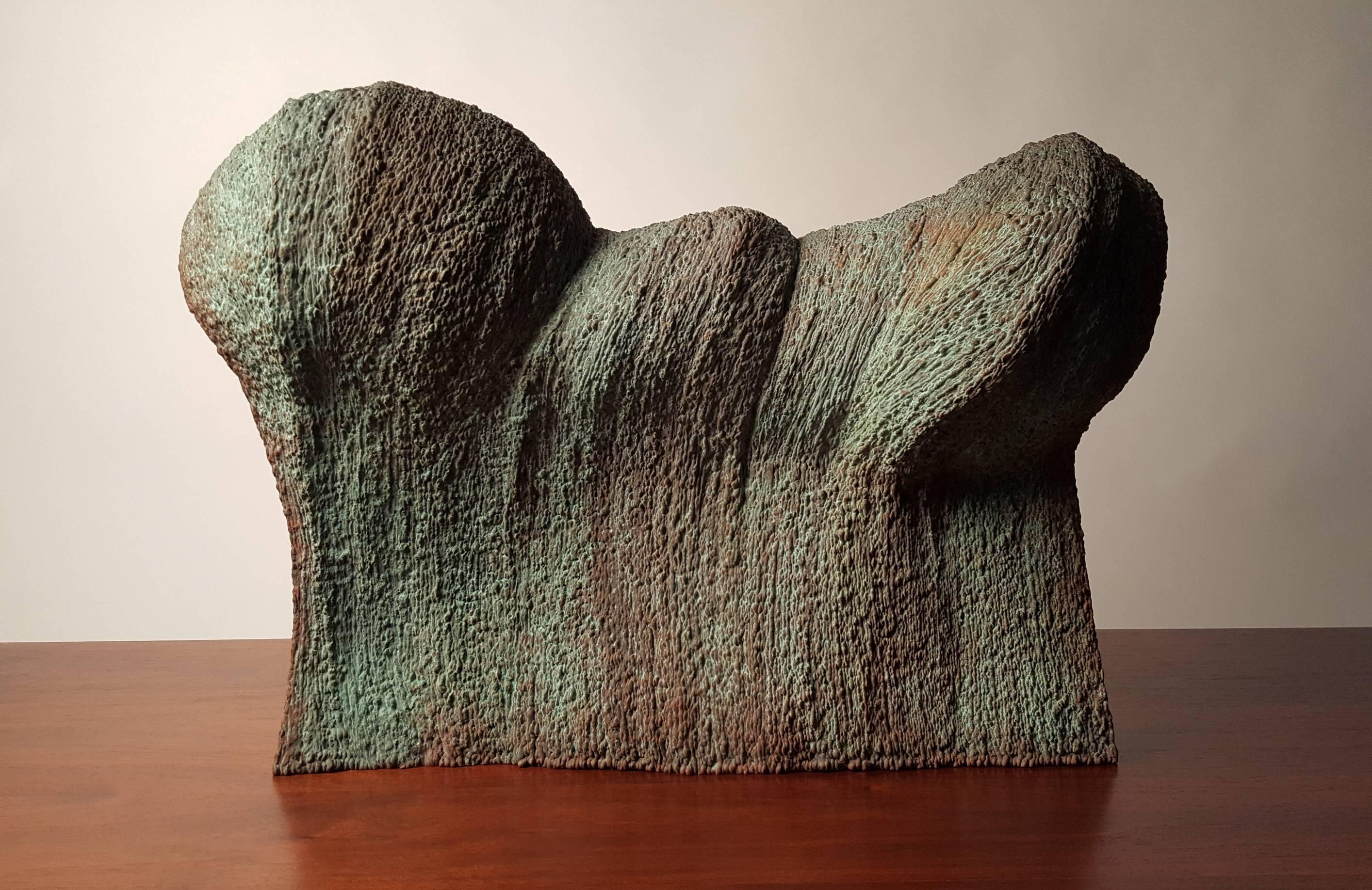 20c design is proud to represent this phenomenal abstract waveform sculpture created by contemporary artist Douglas Ihlenfeld. It is crafted from hand-welded bronze with an applied verdigris patina. This sculpture represents a tremendous amount of