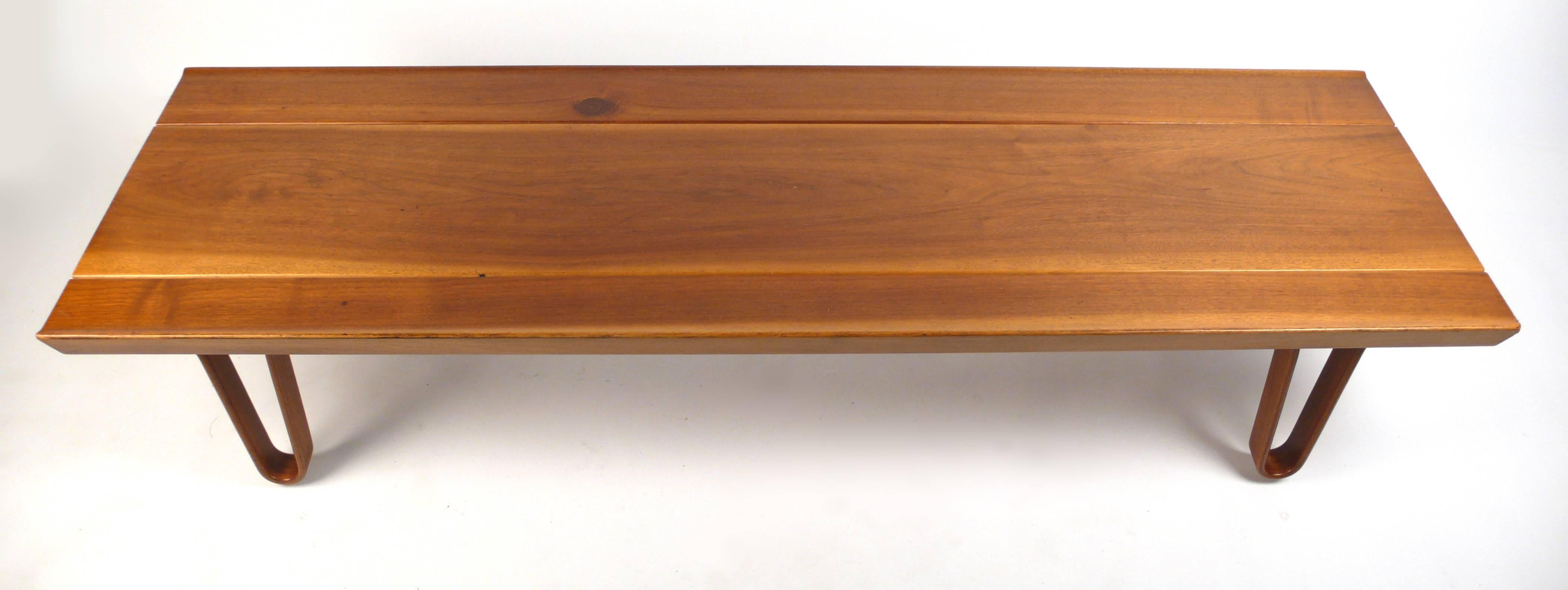 Long-John Bench designed by Edward Wormley for Dunbar. Solid walnut top with wood hairpin legs.
