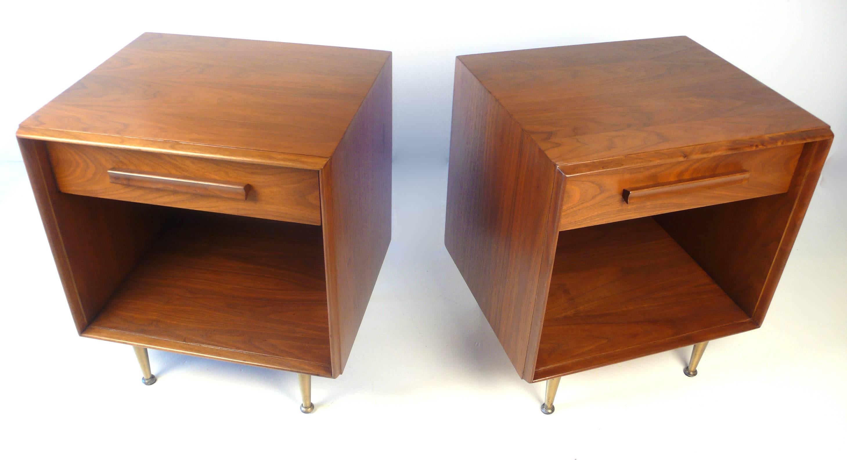 Widdicomb cabinets in American walnut with brass legs. They would serve well as nightstands or as end tables.