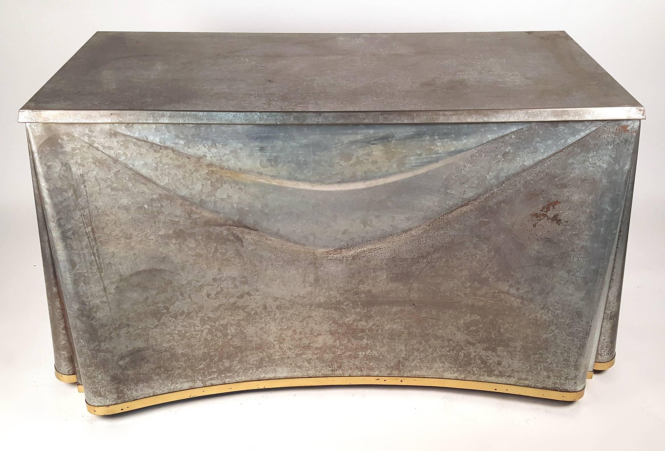 Beautiful John Dickinson Galvanized steel console signed to brass plate. Manufactured under license by Sutherland. Out of production. Gorgeous patina to steel. Top surface measures: 21 x 48.5