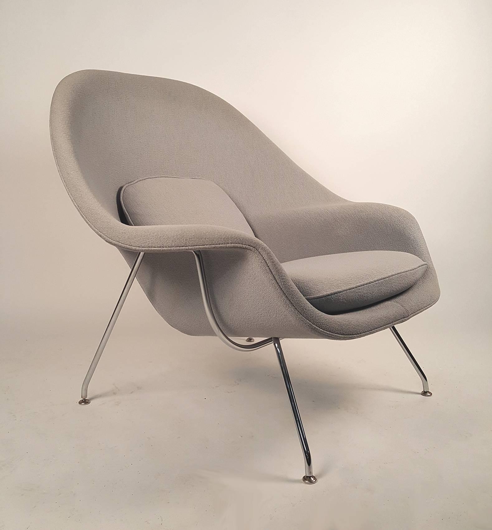 Womb chair designed by Eero Saarinen and produced by Knoll. Retains paper label to underside. Matching pair available.  $3400 each. Original upholstery.