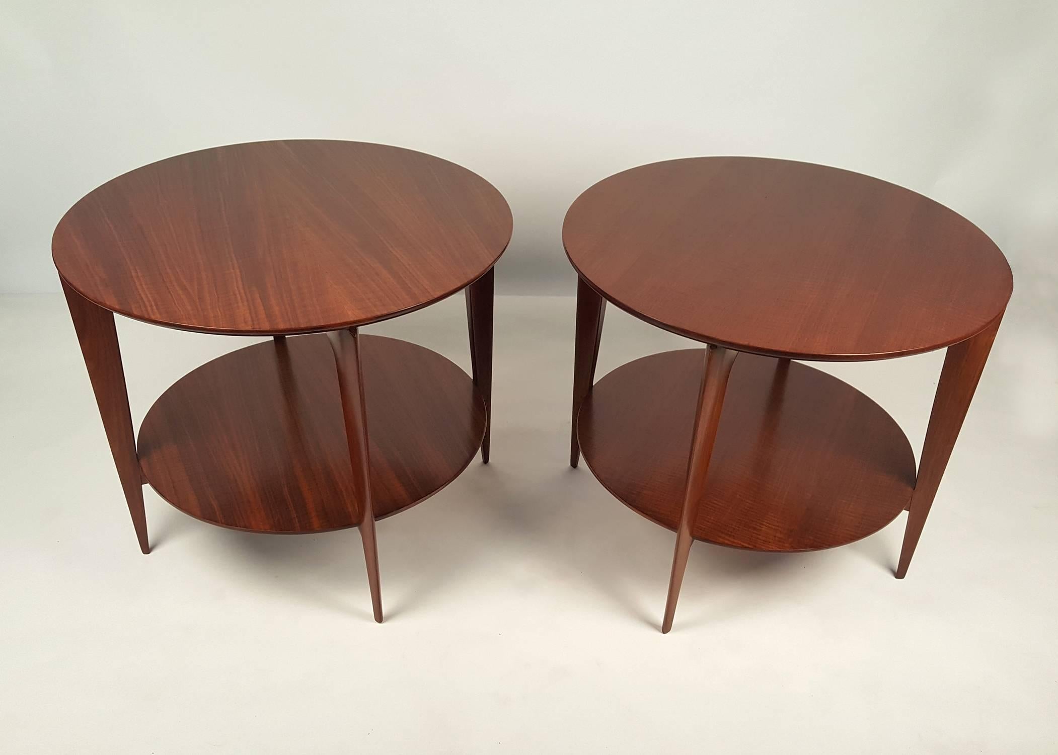 Elusive pair of Gio Ponti two-tier end tables for M. Singer & Sons in Italian Walnut. Model 2135.
Both tables retain the original paper label.
