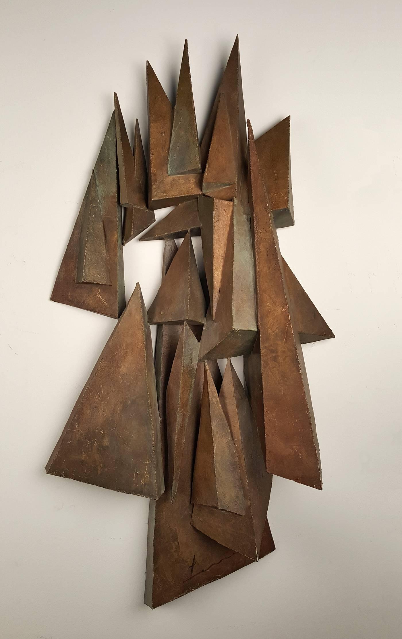 Vintage hand-crafted 1970s Brutalist wall relief sculpture. Welded steel with an applied finish. Signed but illegible. 

