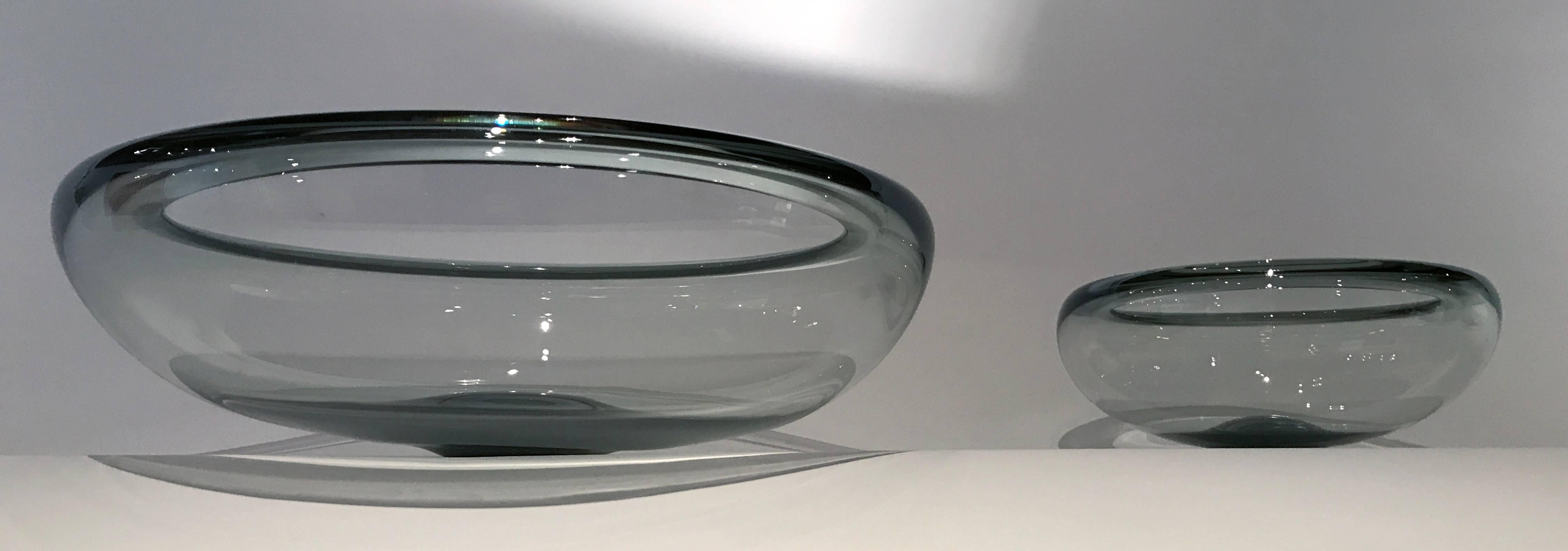 Beautiful large and medium-size glass bowls by Per Lutken for Holmegaard, Denmark, 1960s.
The large bowl measures 17