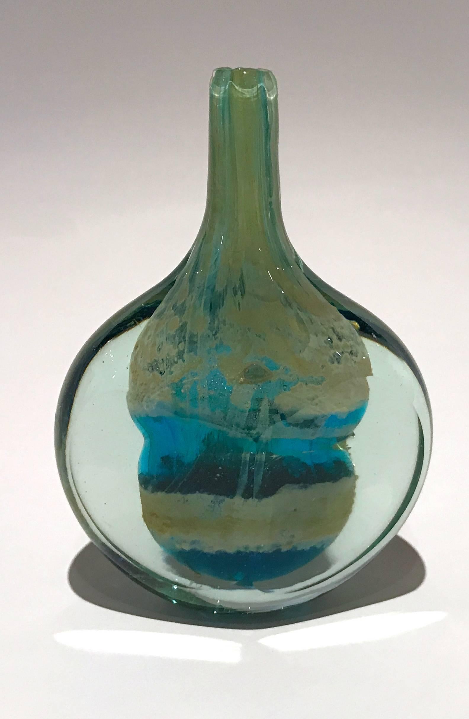 Early handcrafted glass 'Cut Ice' fish vase by Michael Harris for Mdina glass on the Mediterranean island of Malta. Signed Mdina on the base.

Michael Harris 1933-1994. Michael Harris, a lecturer in industrial glass design at the Royal College of