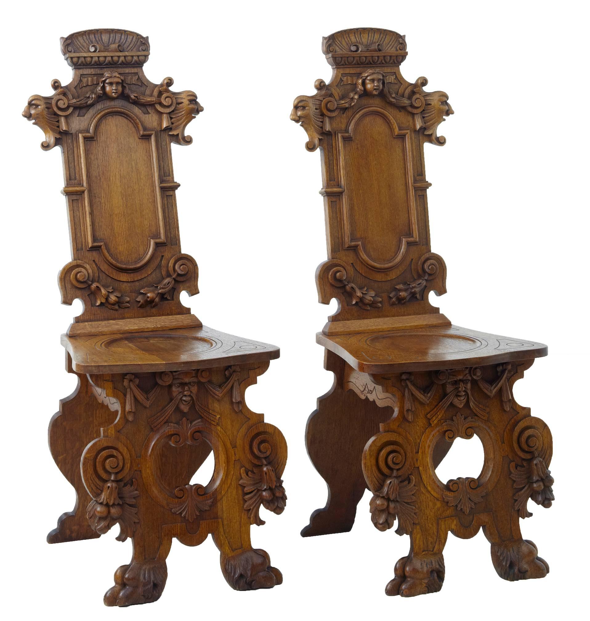 Pair of 19th Century Flemish Carved Oak Hall Chairs