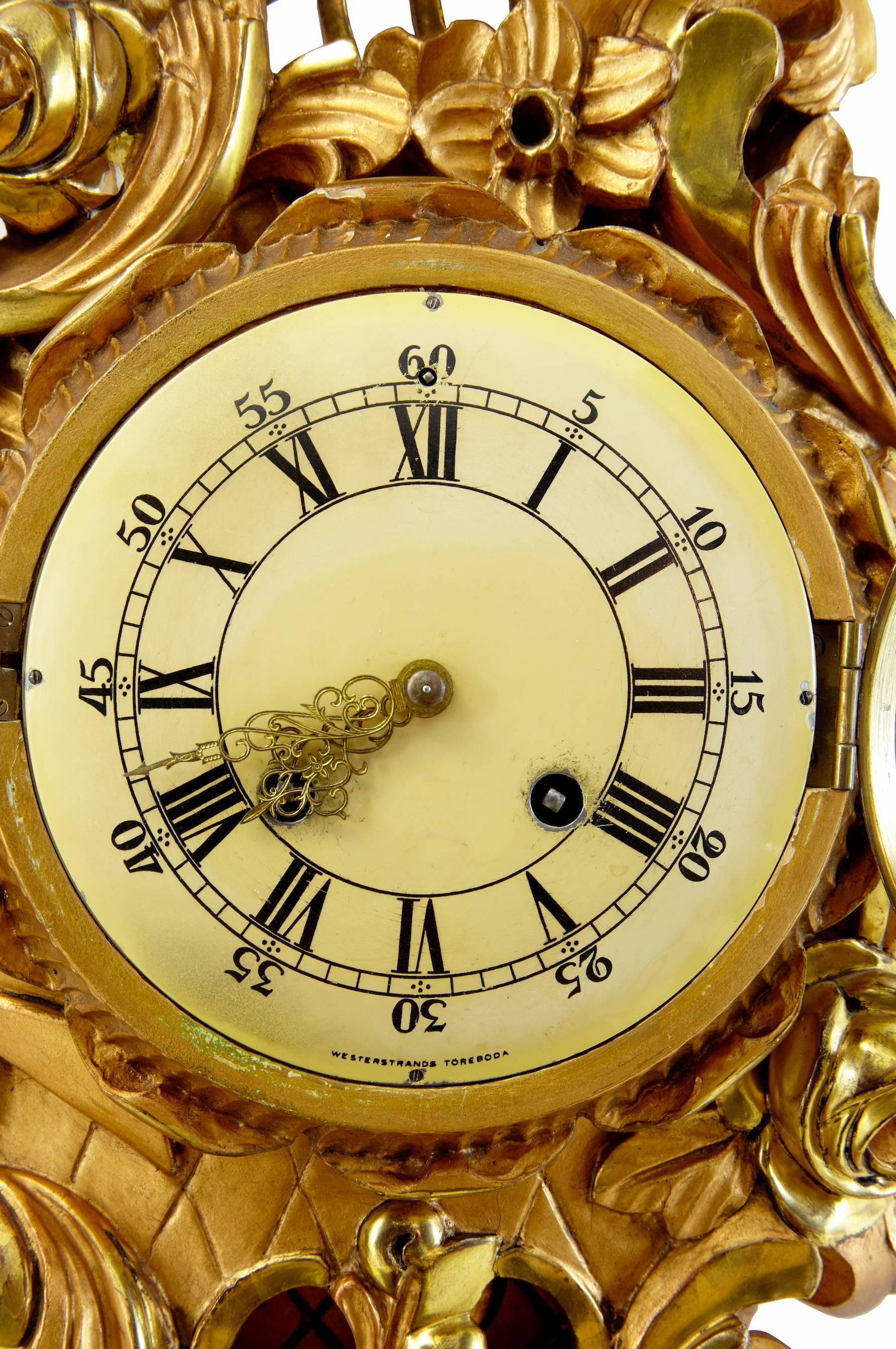 Fine quality Swedish clock circa 1940.
Rich in color.
Some wear to enamel dial surface.
Repairs to woodwork
We recommend that this clock receives a professional service.

Height: 25