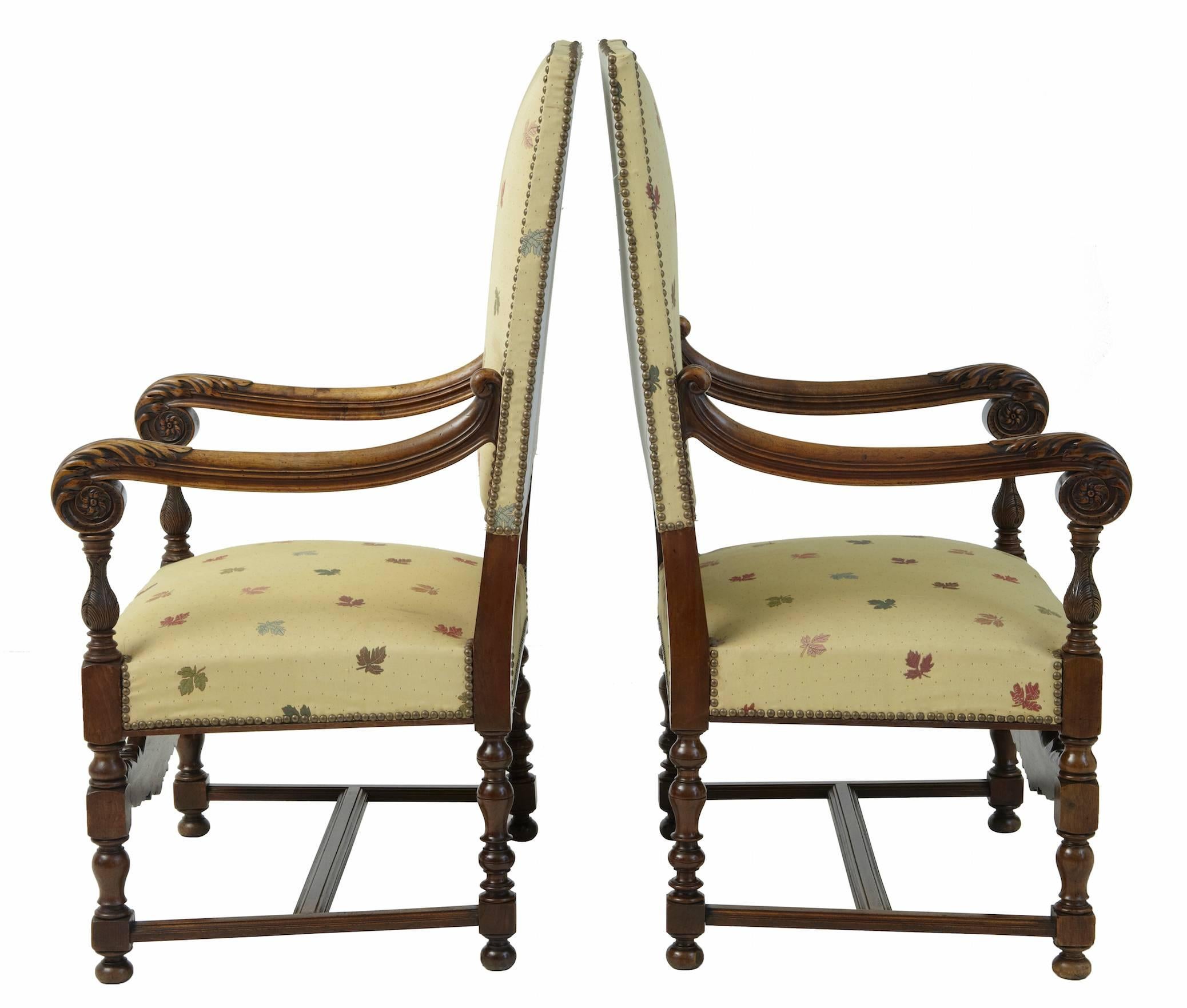 Stunning pair of slightly oversized French armchairs, circa 1880.
Beautifully carved to the lower back and front rail. Scrolling arms with turned supports.
Standing on four turned legs united by H-frame stretcher.

Measures: Height 46
