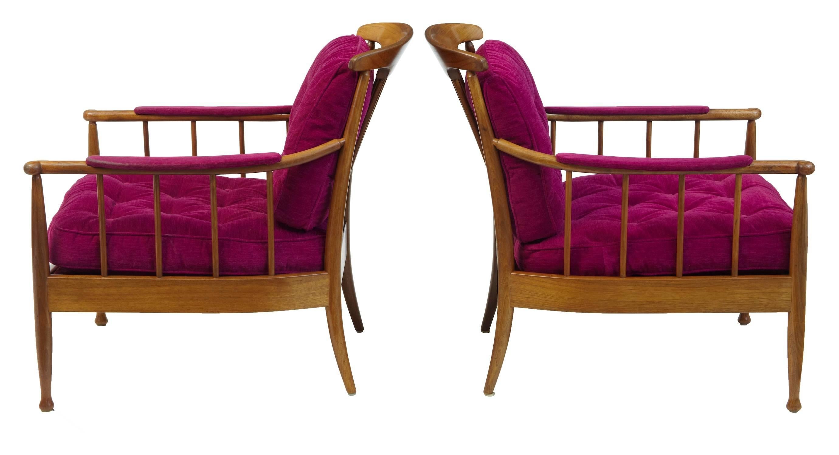 Iconic pair of chairs designed by kerstin horlin-holmquist, circa 1963.
Made by ope with their stamps on each chair.
Made in beech, colored to walnut.
Striking purple button back uphostery.
Minor wear to arms.

Measures: Height: 31