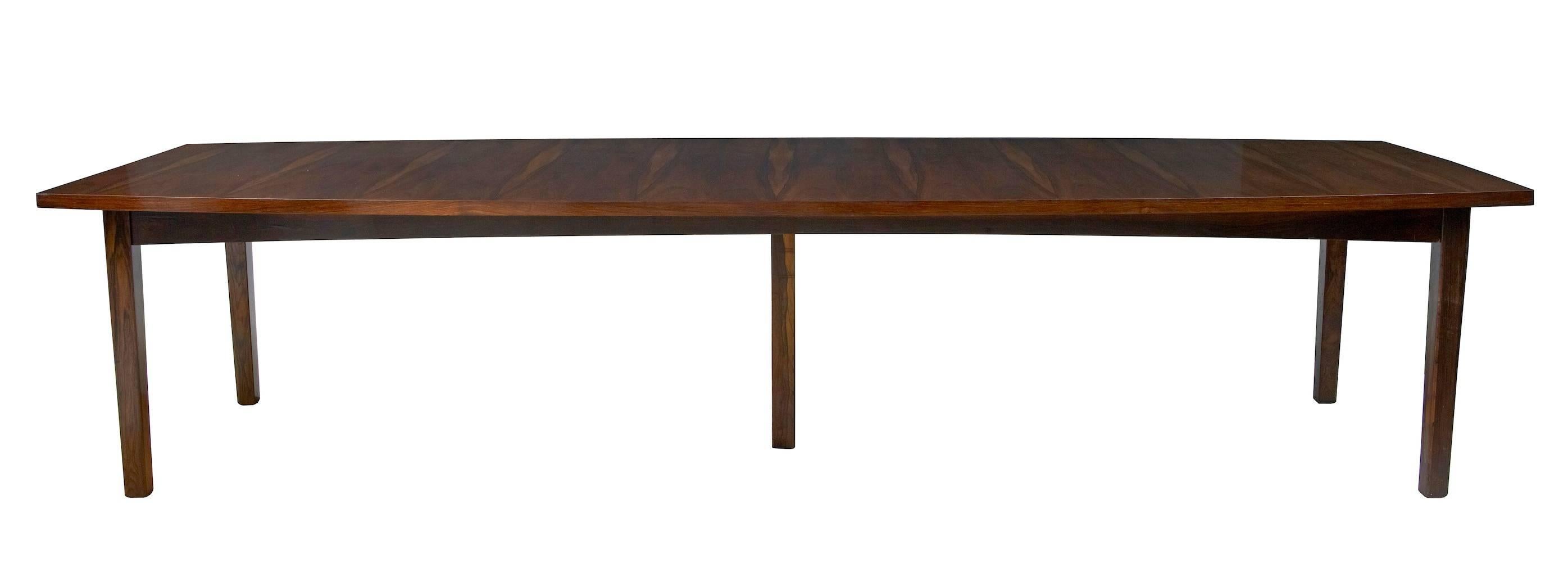 Large 1960s Danish rosewood dining table
Excellent quality rosewood veneered dining table, circa 1960
The top features some very striking veneers, which has been repolished by hand to restore it to its former color.
Seats an easy 14.
1 1/4