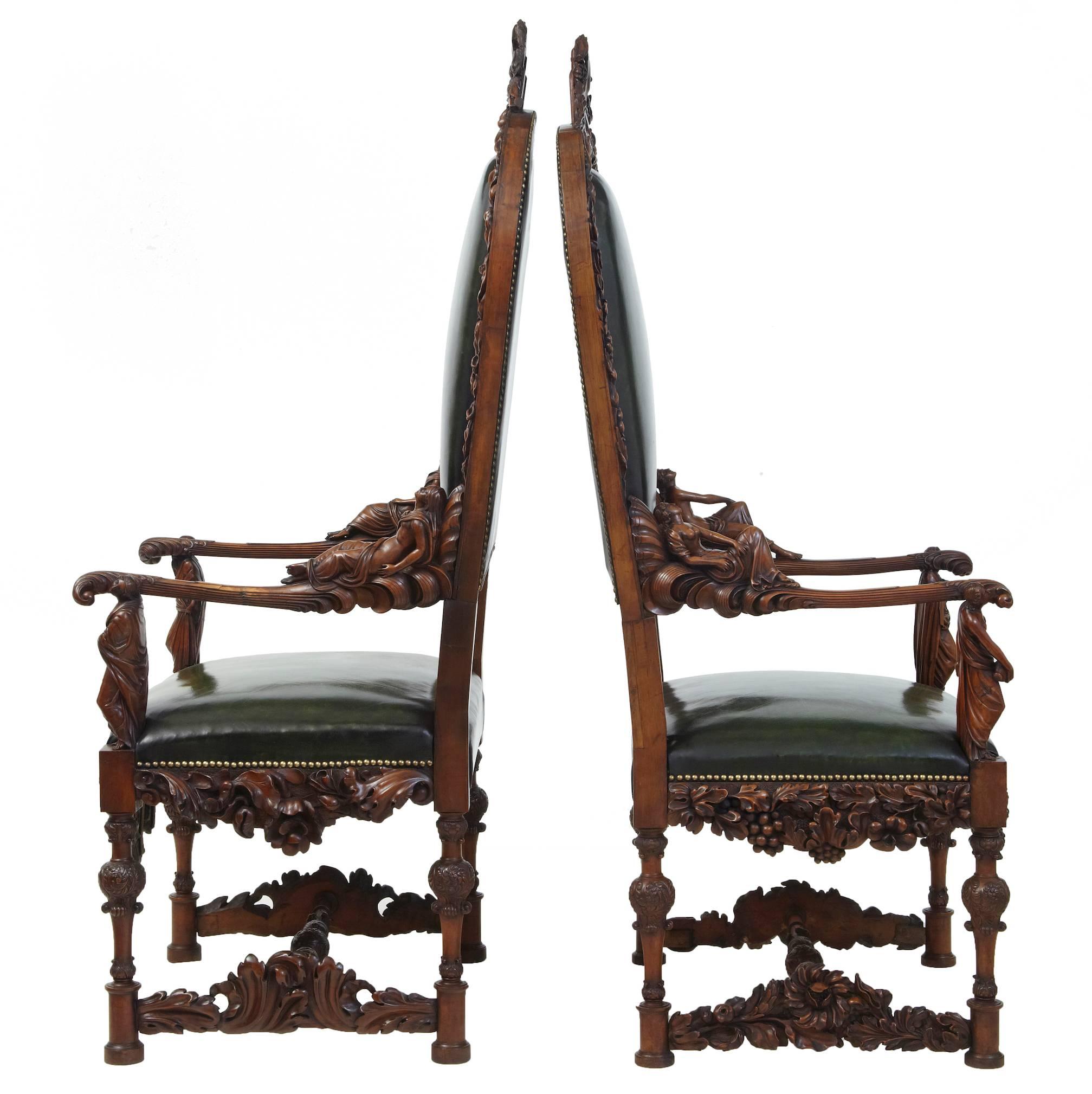 Pair of 19th century carved walnut Florentine Renaissance armchairs
Stunning carved Renaissance Revival throne chairs, circa 1860.
Profusely carved all-over.
Depicting eight classical carved figures, four of which are reclining nudes.
Fluted