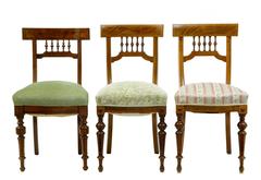 Harlequin Set of 12 Walnut Spindle Back Dining Chairs