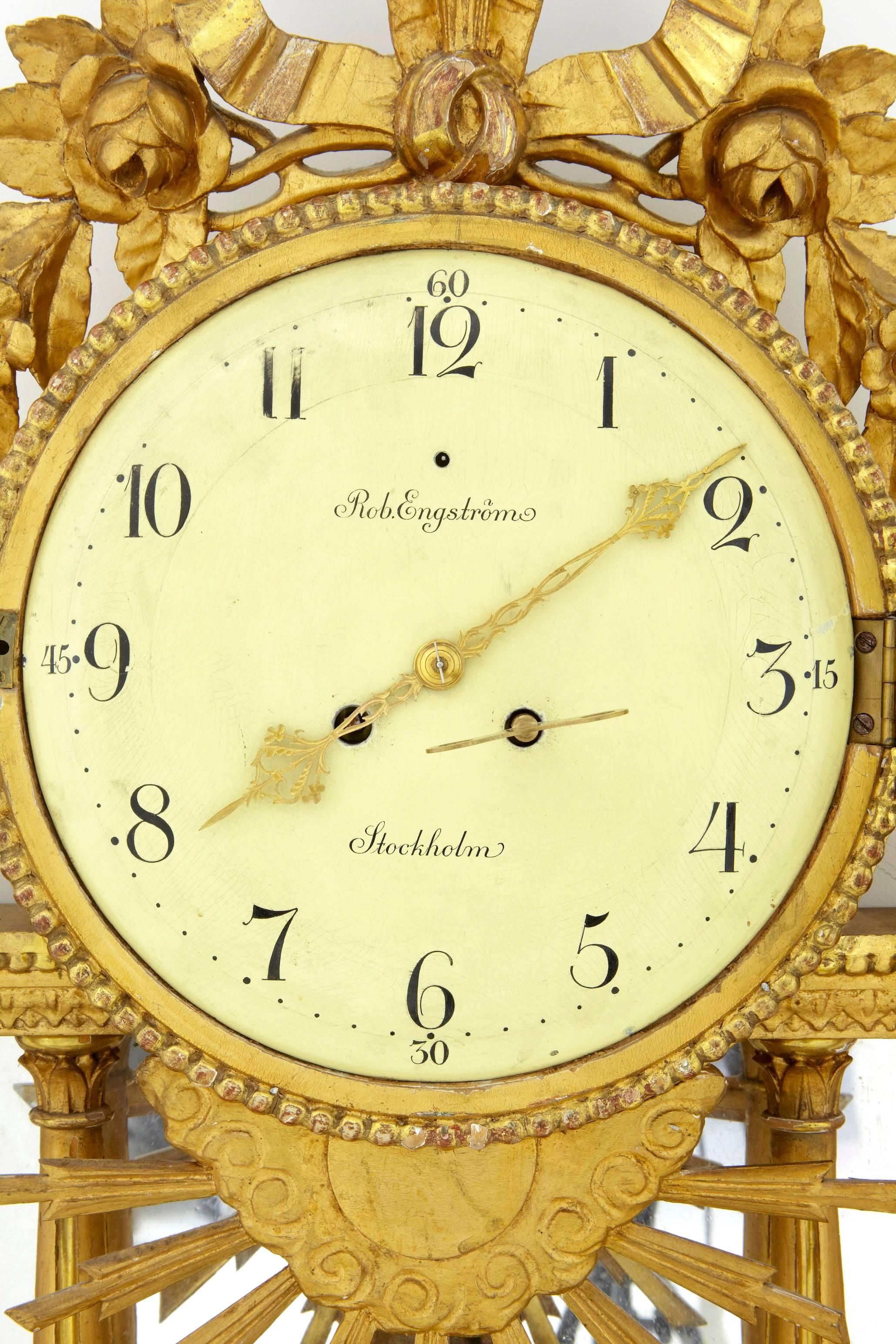 Fine quality Swedish wall clock in the empire taste, circa 1895.
Movement stamped b & w, which is by German Company Berger & Wurker. Clock by Rob Engstrom of Stockholm.
Rubbing and marks to clock face.
Slight gilt losses.

We recommend that
