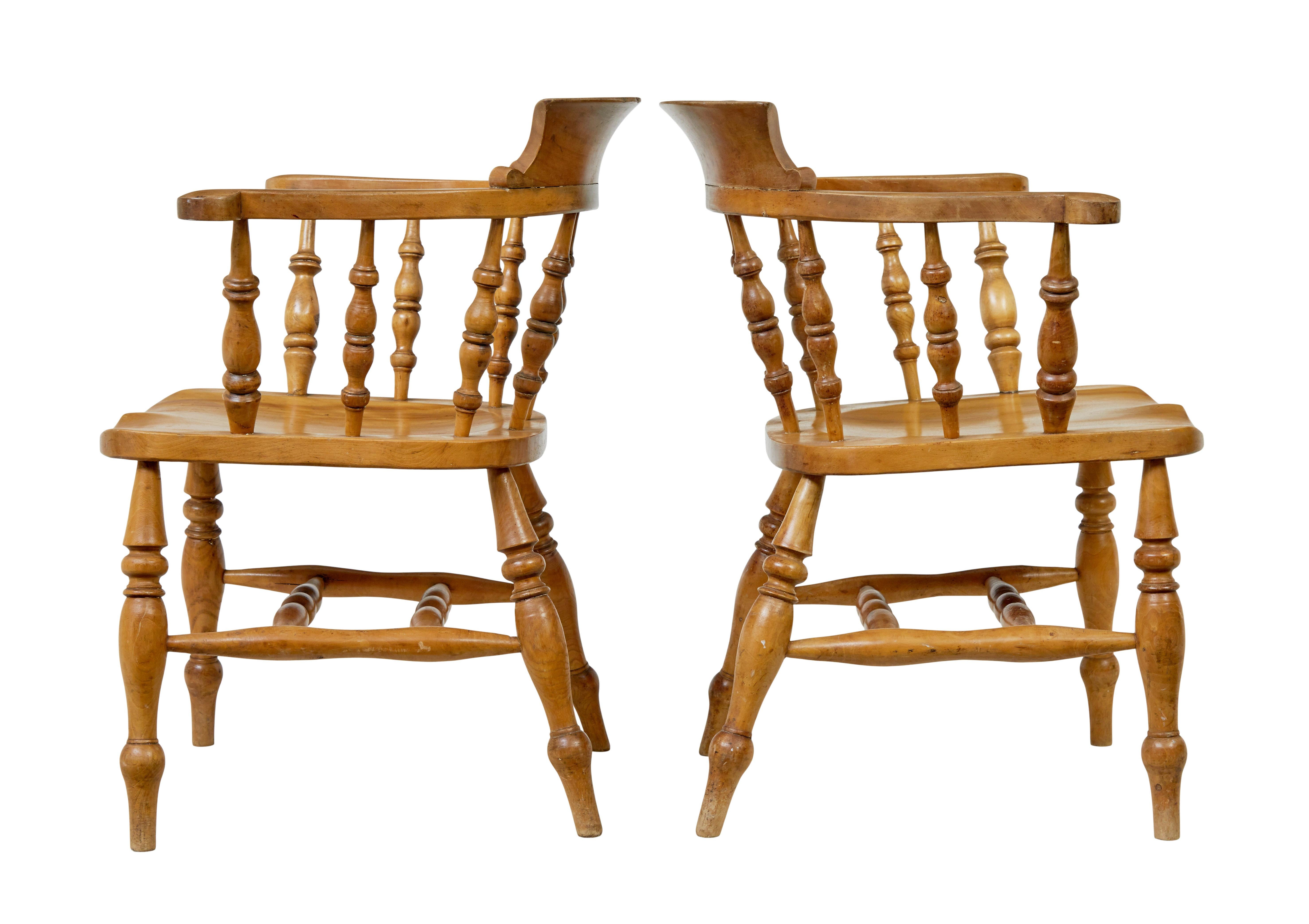 Pair of 19th century elm elbow chairs circa 1890.

Good quality pair of english elm elbow armchairs, each stamped with a crown on the back of each seat, indicating a possible royal country house connection.

Shaped backs with turned spindle supports