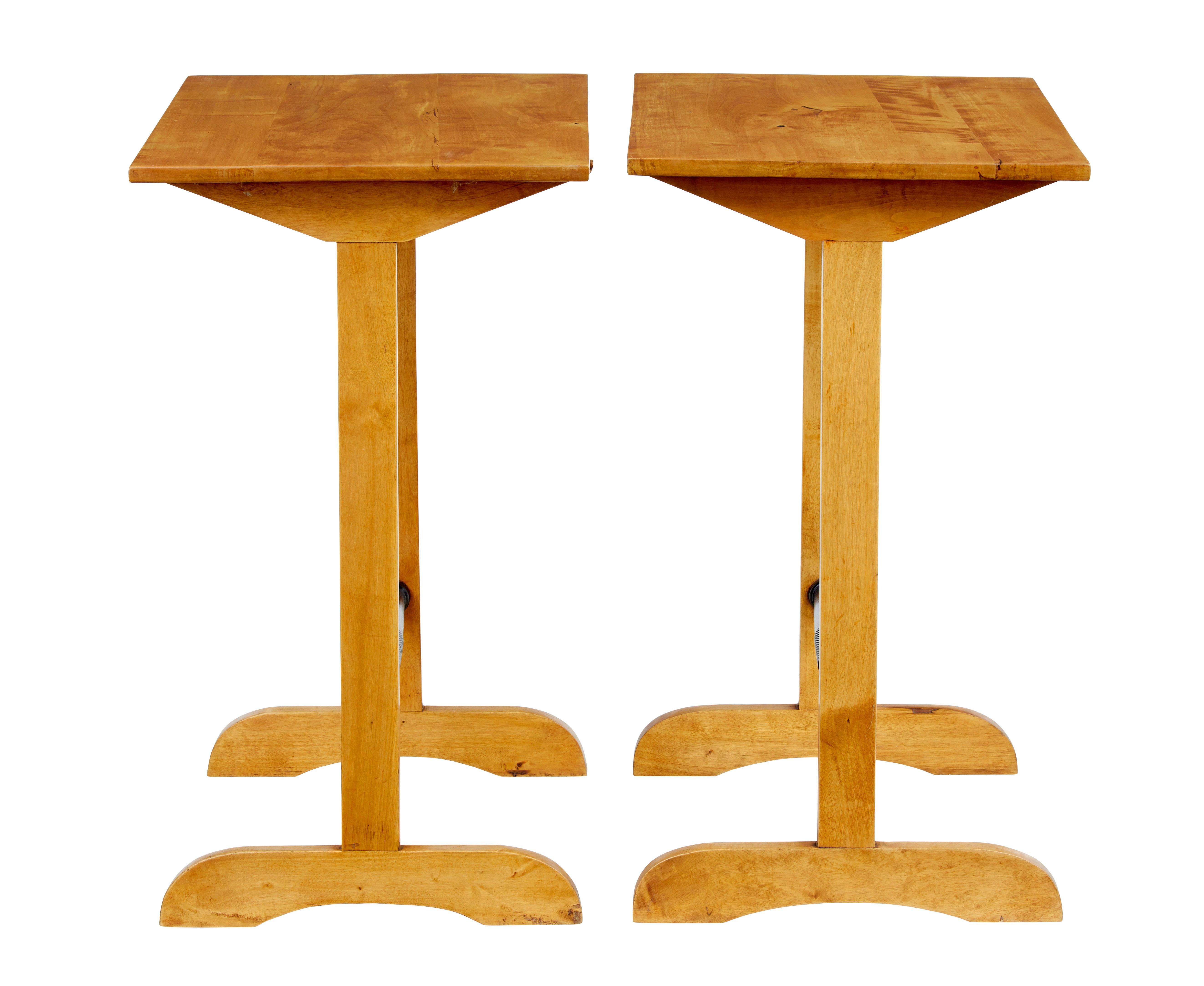 Pair of early 20th century Swedish birch side tables circa 1920.

Unusual pair of birch tables that have potential multiple uses, but we think they would work well as a pair of lamp tables.  Recently restored and back to their rich birch colour. 